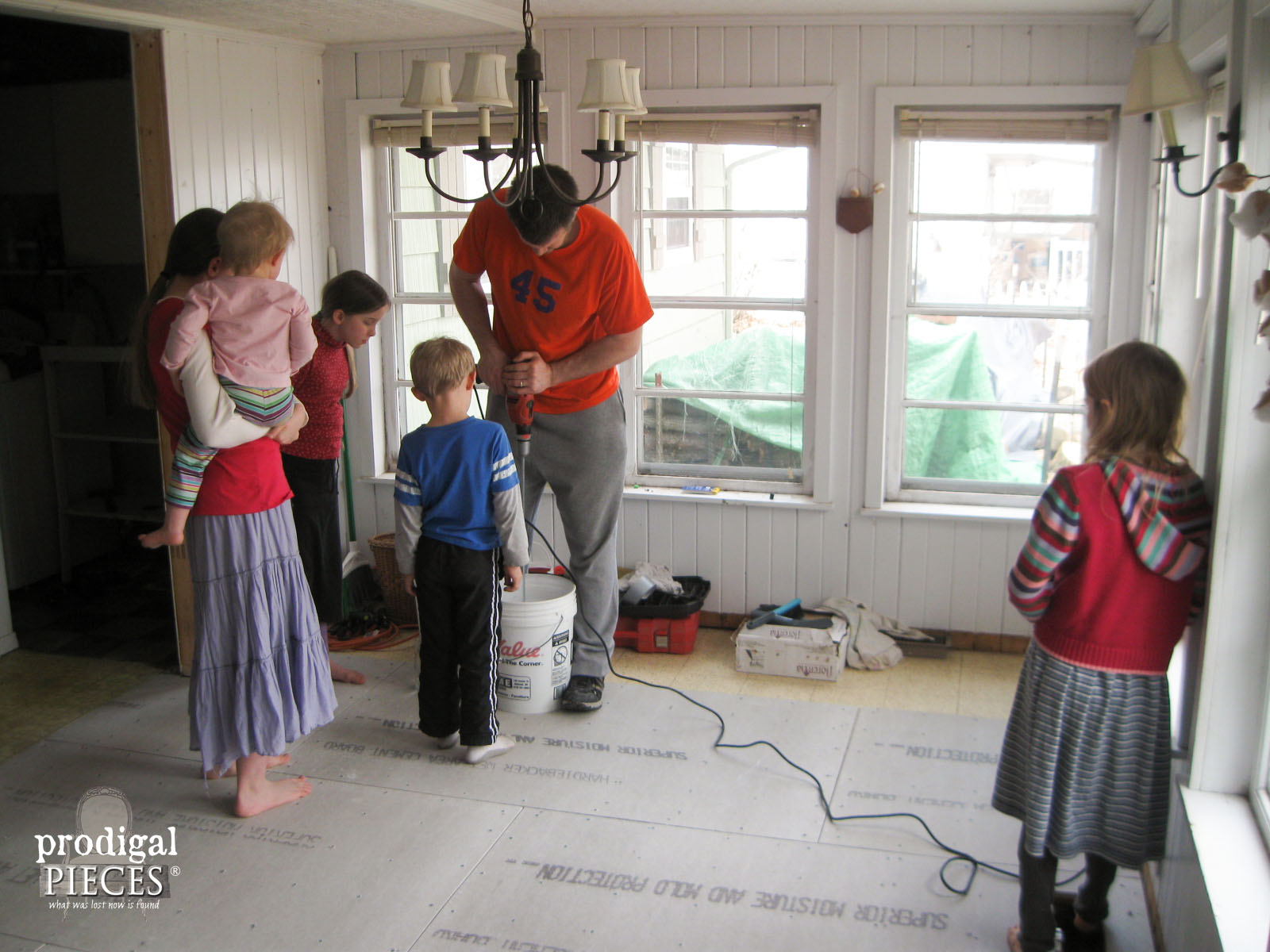 Kids Watching While Dad Mixes Mortar for Tile Floor | Prodigal Pieces | www.prodigalpieces.com