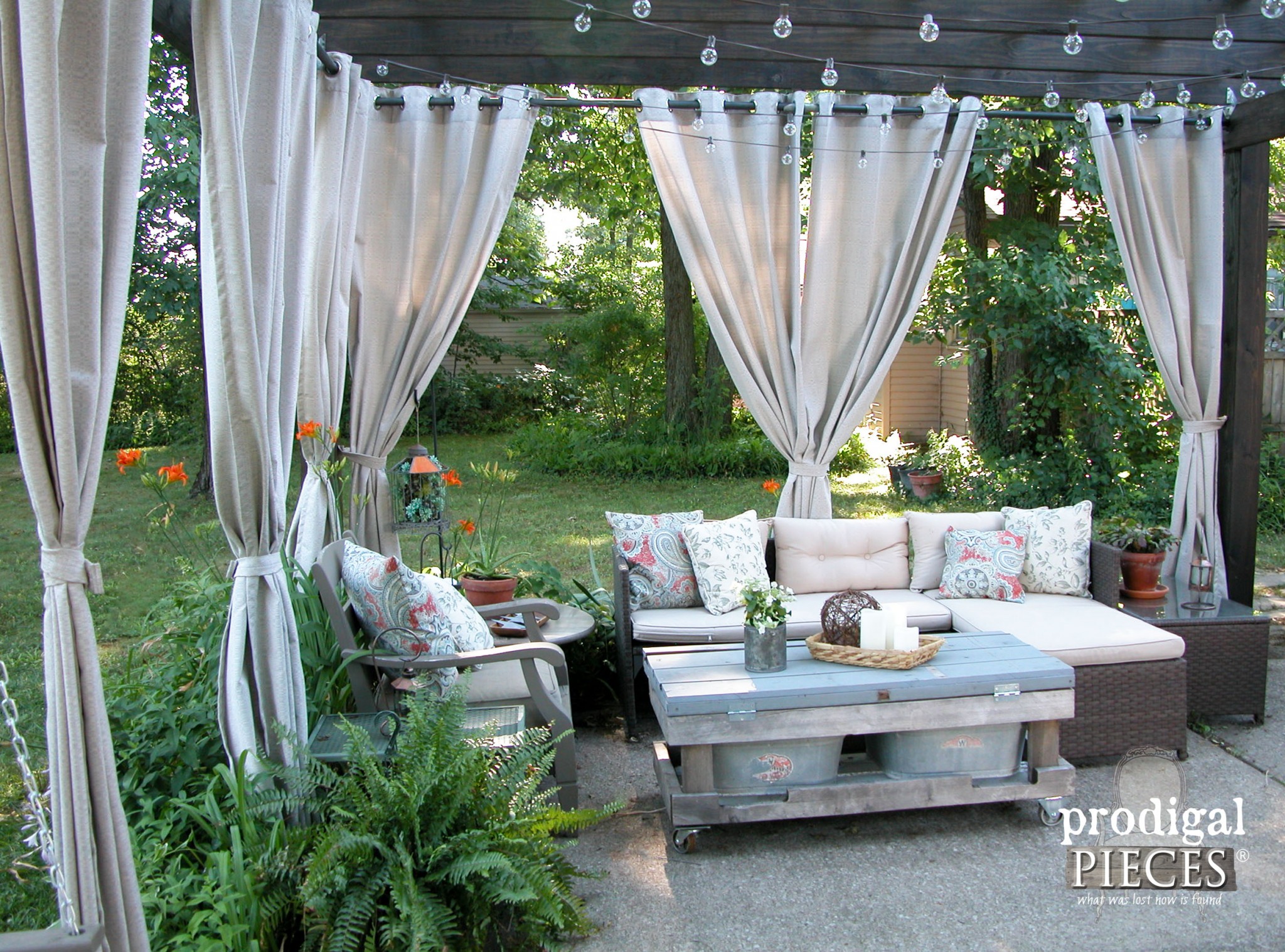 Seating Area with Outdoor Curtains on Pergola by Prodigal Pieces | www.prodigalpieces.com