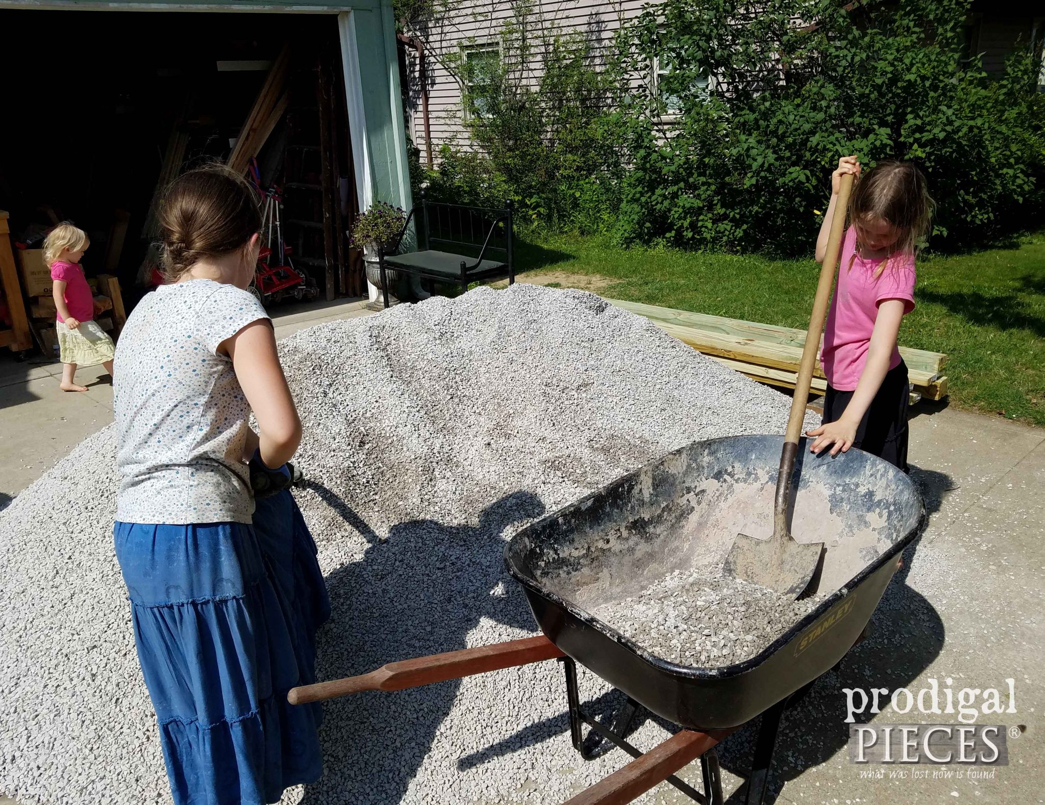 Moving Gravel for Backyard Fire Pit | prodigalpieces.com