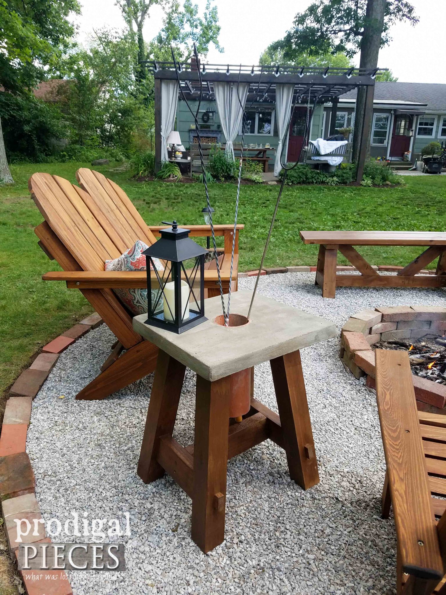 Concrete Fire Pit Table with Roasting Stick Holder by Prodigal Pieces | prodigalpieces.com