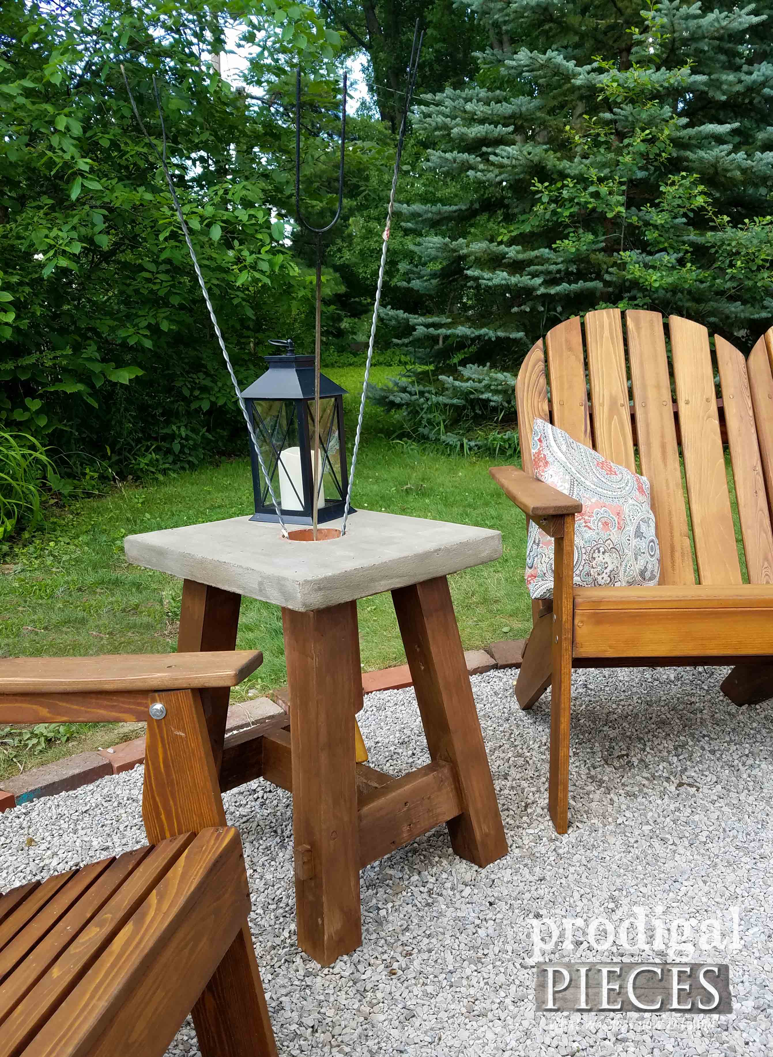 Concrete Table for Fire Pit with Roasting Stick Holder. DIY Build Plans by Prodigal Pieces | prodigalpieces.com