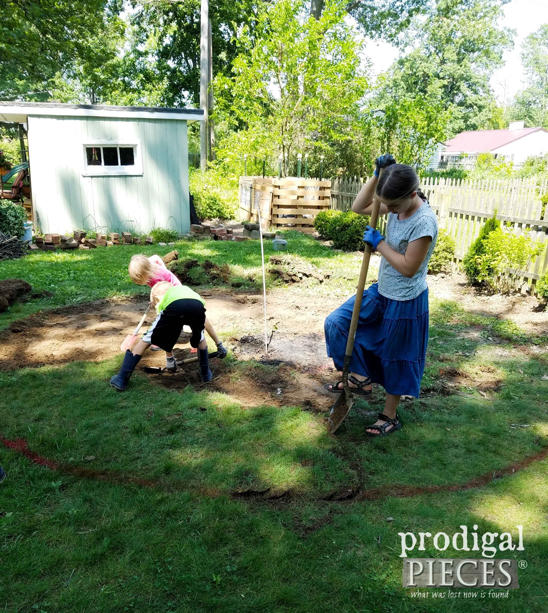 Kids Helping Remove Sod for DIY Fire Pit | prodigalpieces.com