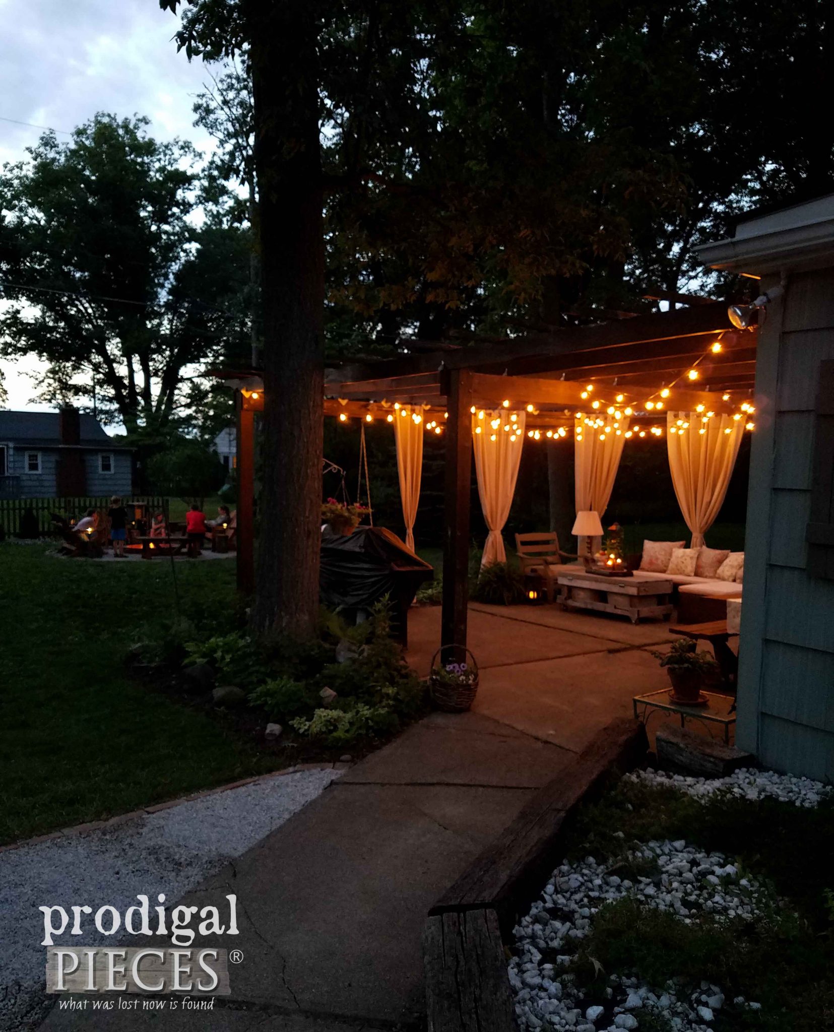 Patio with Nighttime Lights and DIY Fire Pit by Prodigal Pieces | prodigalpieces.com