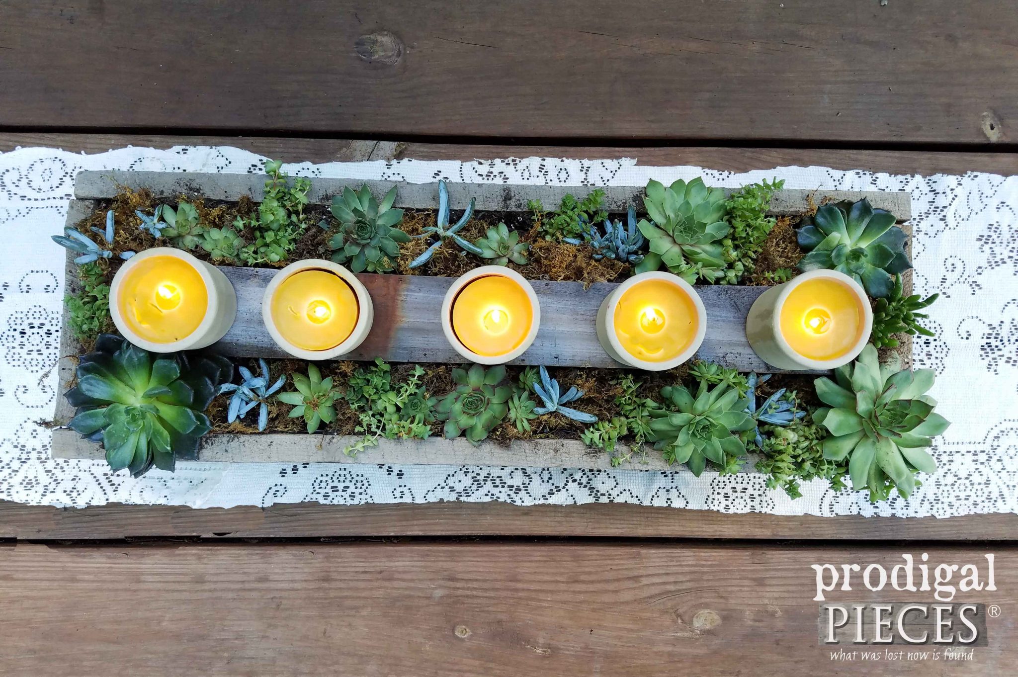 Homemade Beeswax Candles in Succulent Centerpiece by Prodigal Pieces | prodgalpieces.com