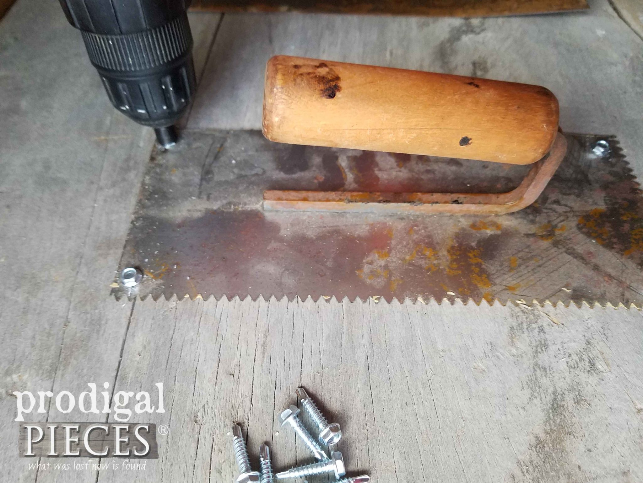 Attaching trowels to barn wood for Flea Market Decor | prodigalpieces.com