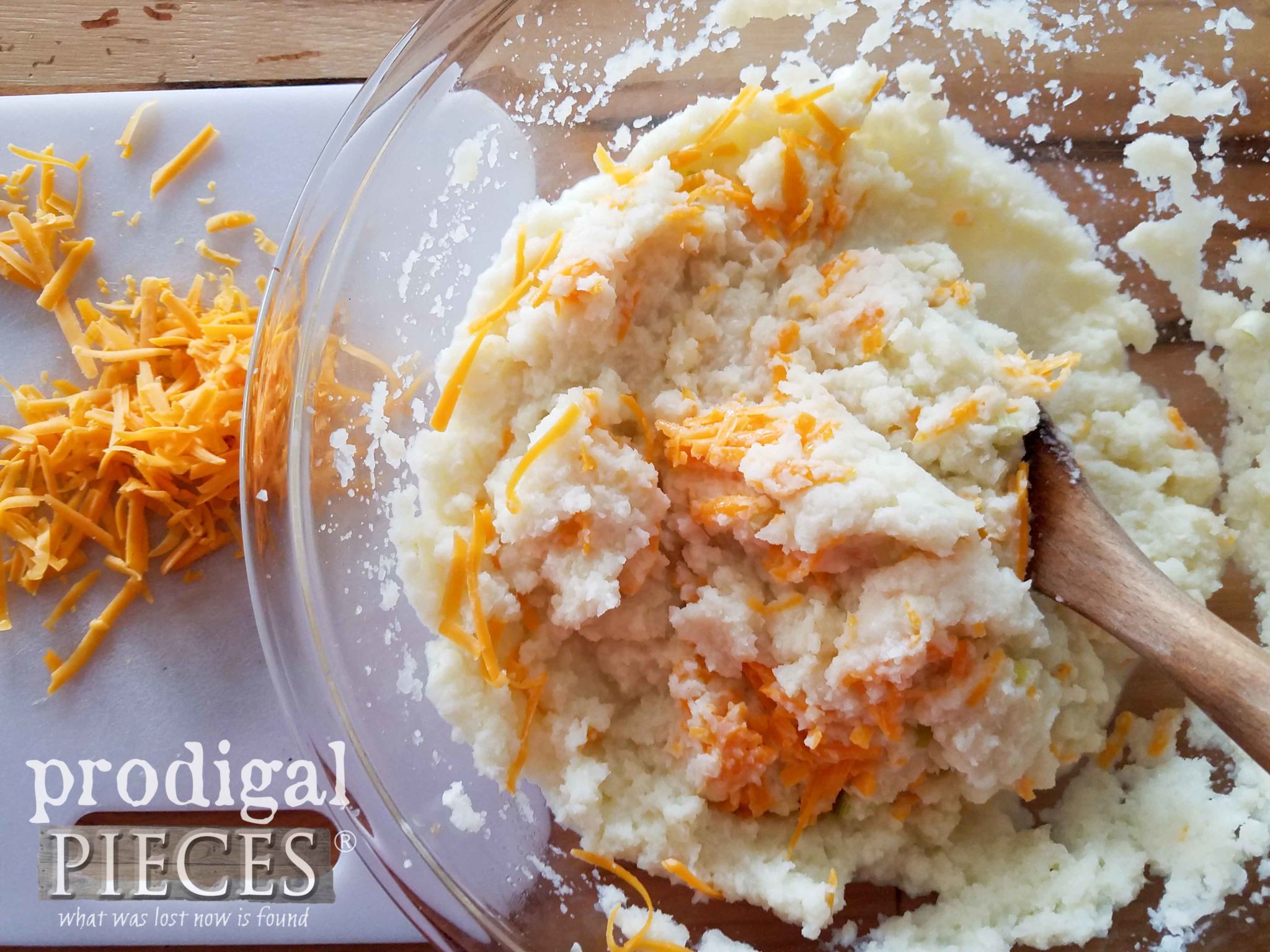 Mixing Ingredients into Potatoless Twice Baked Potatoes with Cauliflower | prodigalpieces.com