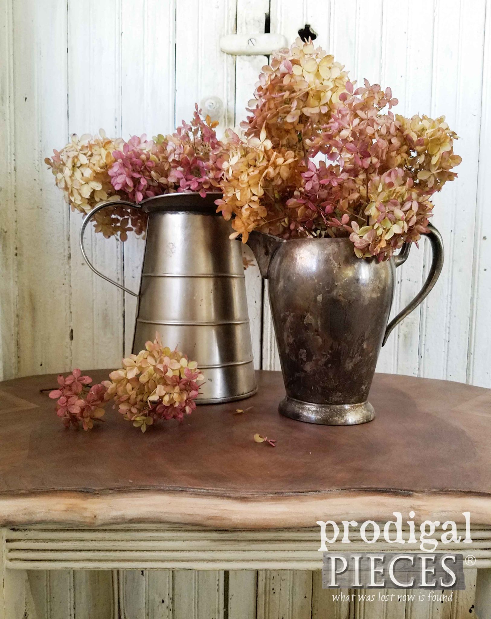 Hydrangea Arrangements in Pewter and Steel Pitchers. Beautiful display by Larissa of Prodigal Pieces | prodigalpieces.com