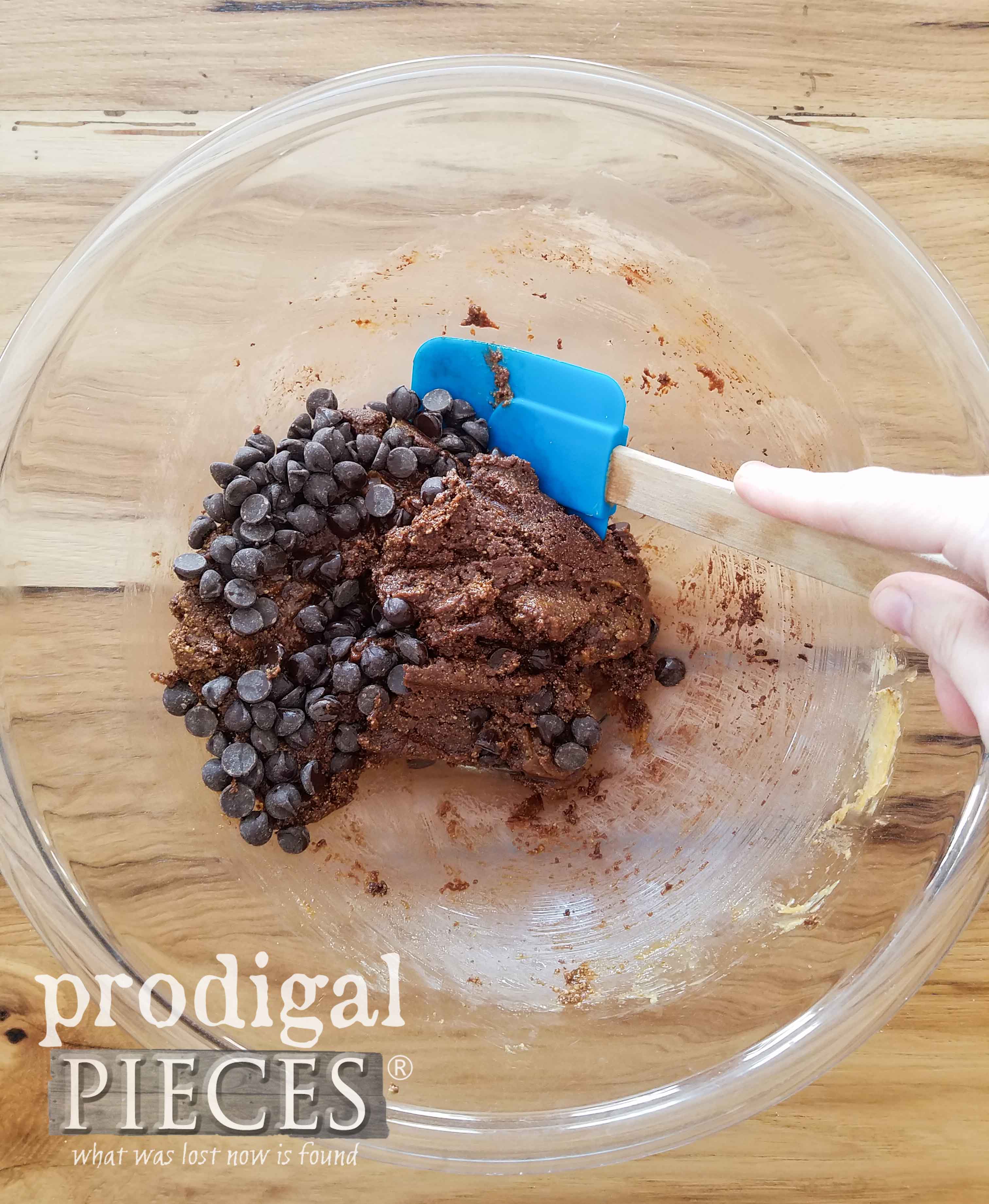 Folding Chocolate Chips into Chocolate Cookie Batter | Recipe by Larissa of Prodigal Pieces | prodigalpieces.com