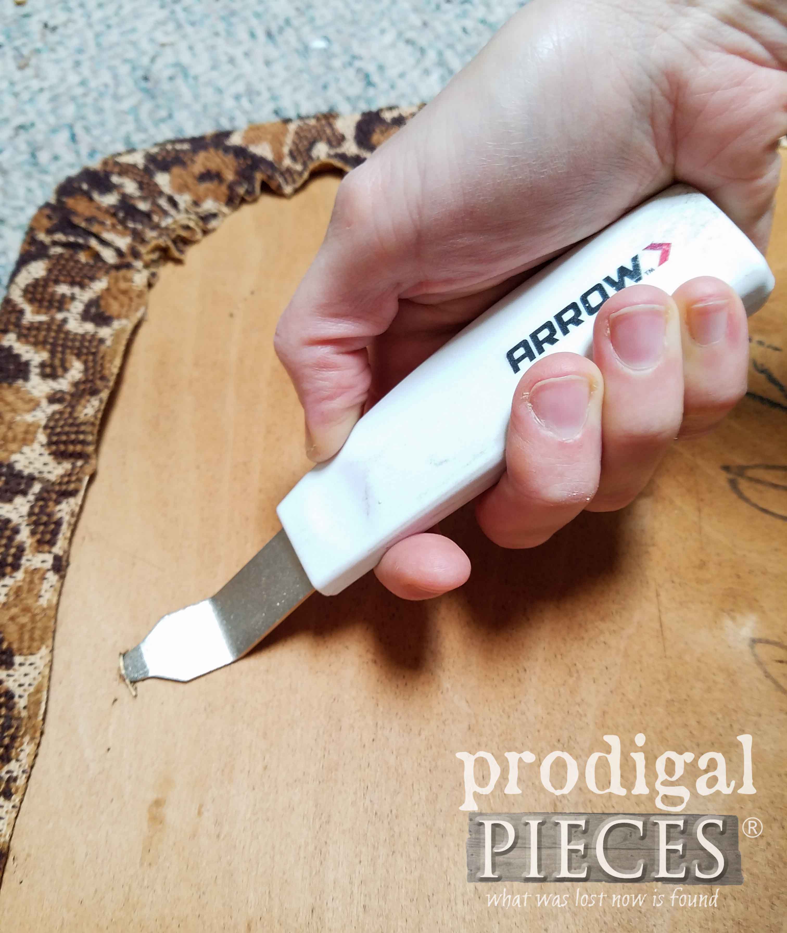 Removing upholstery staples with a staple puller by Prodigal Pieces | prodigalpieces.com