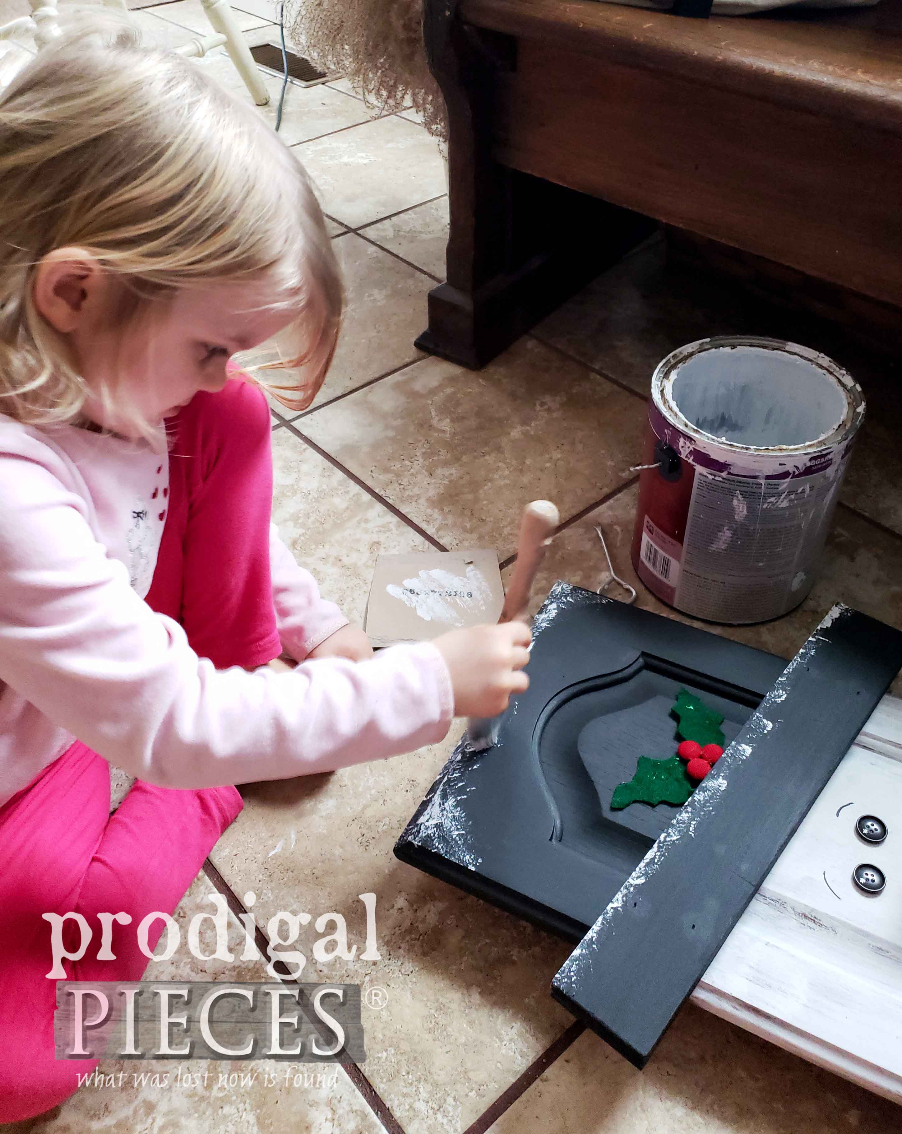 Decorating DIY Snowman from Upcycled Cupboard Door by Prodigal Pieces Kids Create | prodigalpieces.com