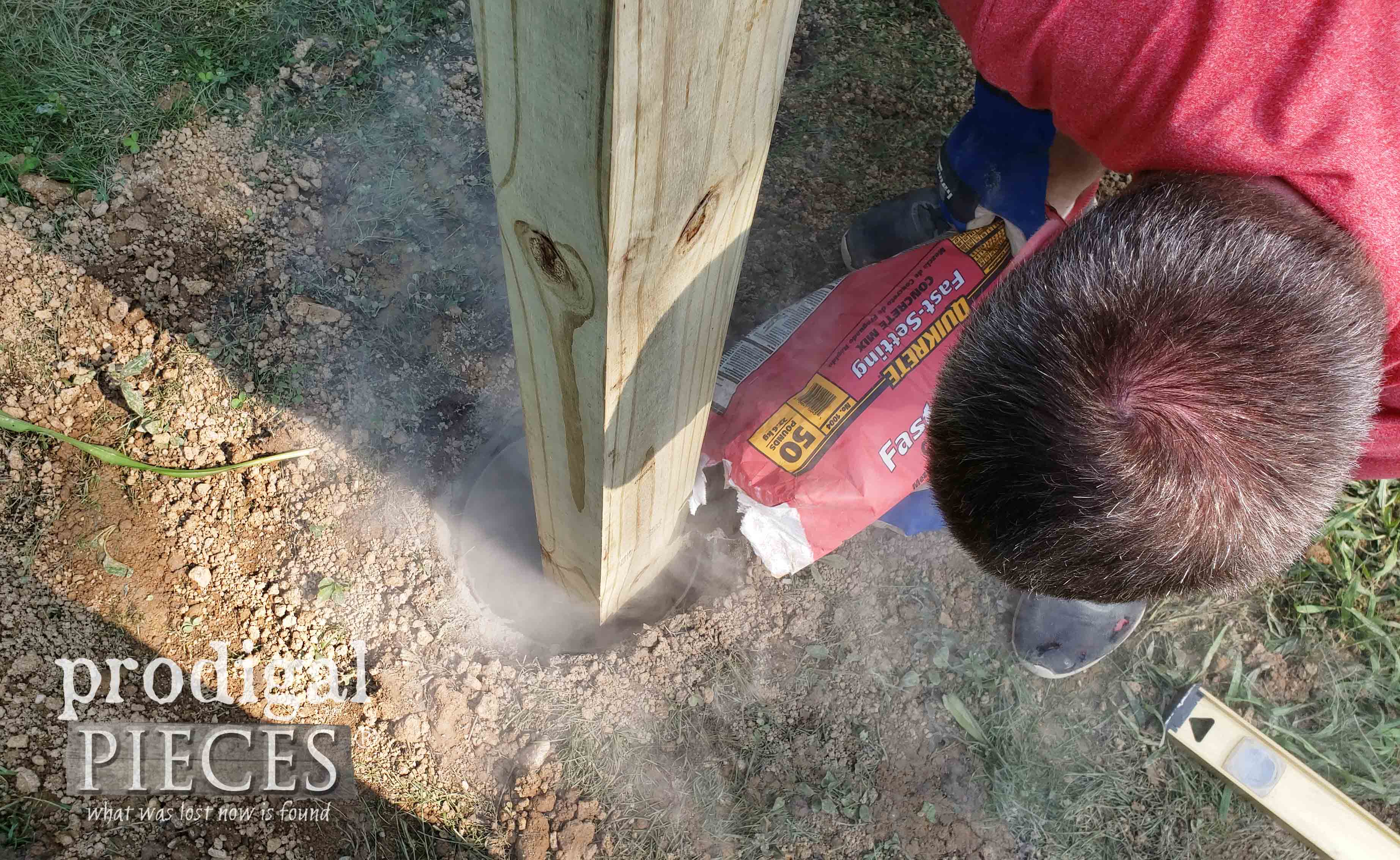 Filling Privacy Fence Post Hole with Concrete | prodigalpieces.com