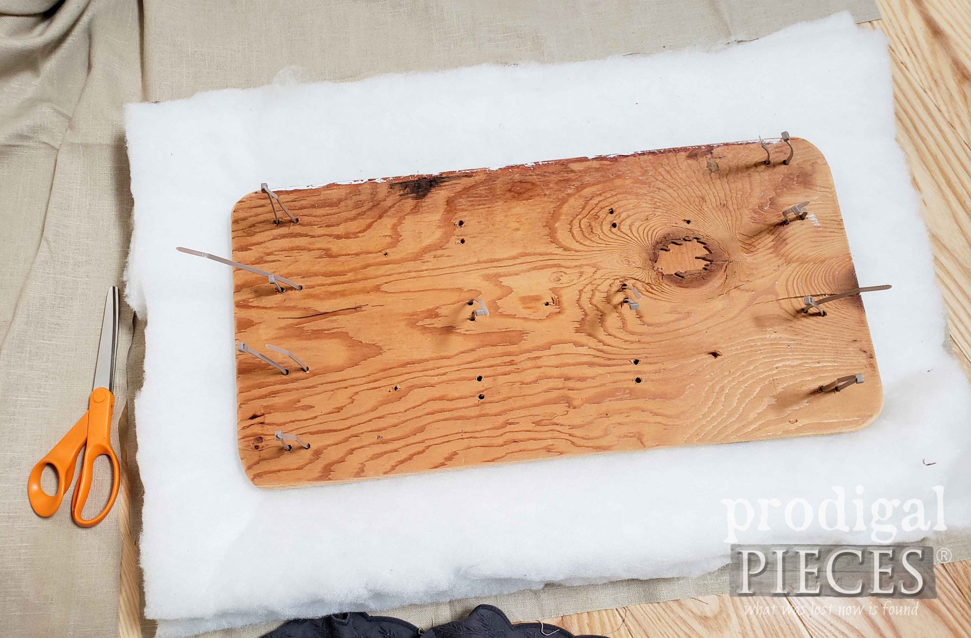 Linen Upholstery Layers | How to Replace a Vanity Seat by Larissa of Prodigal Pieces | prodigalpieces.com #prodigalpieces #diy 