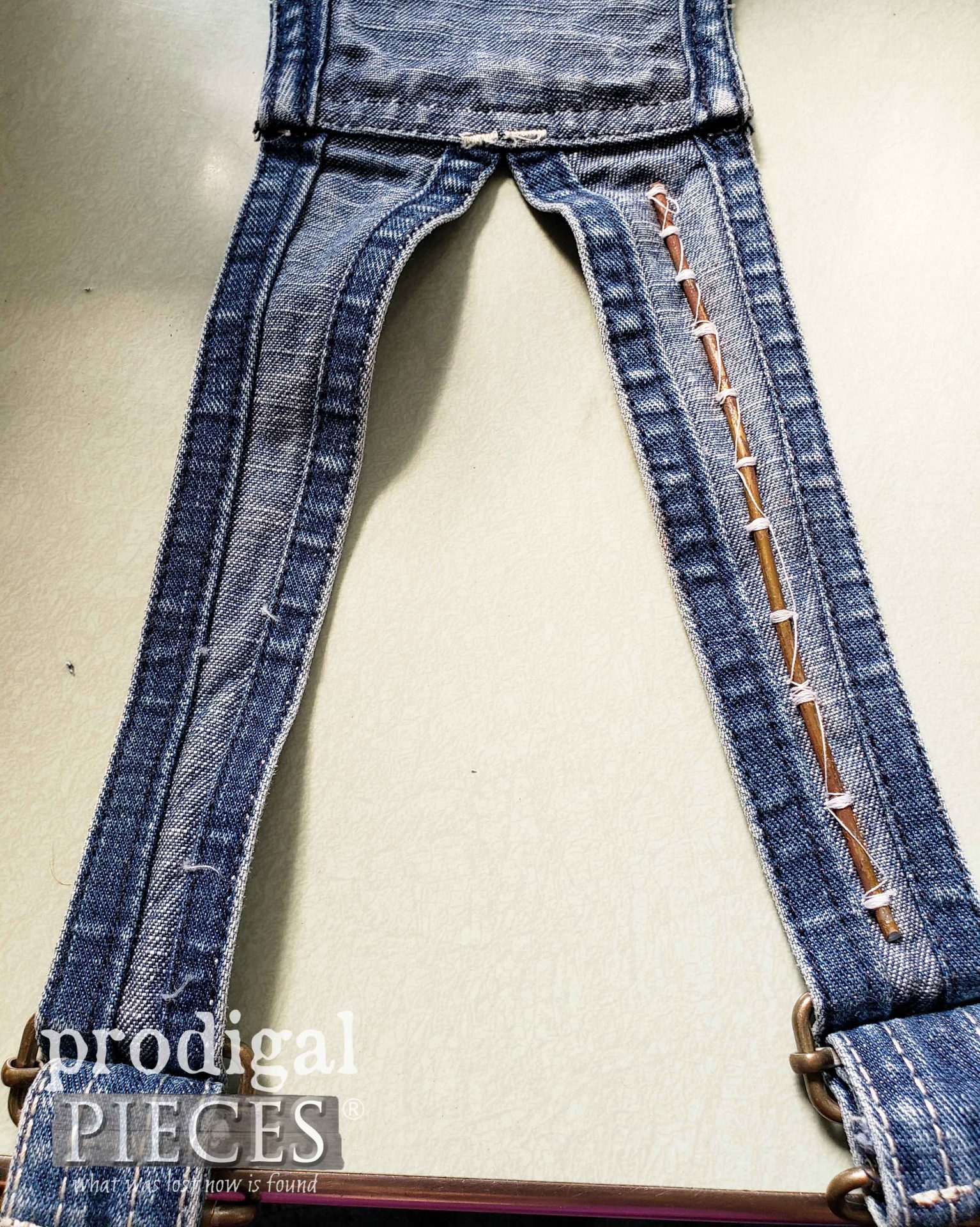 Sewing in Wire into Baby Bib Overall Straps | prodigalpieces.com