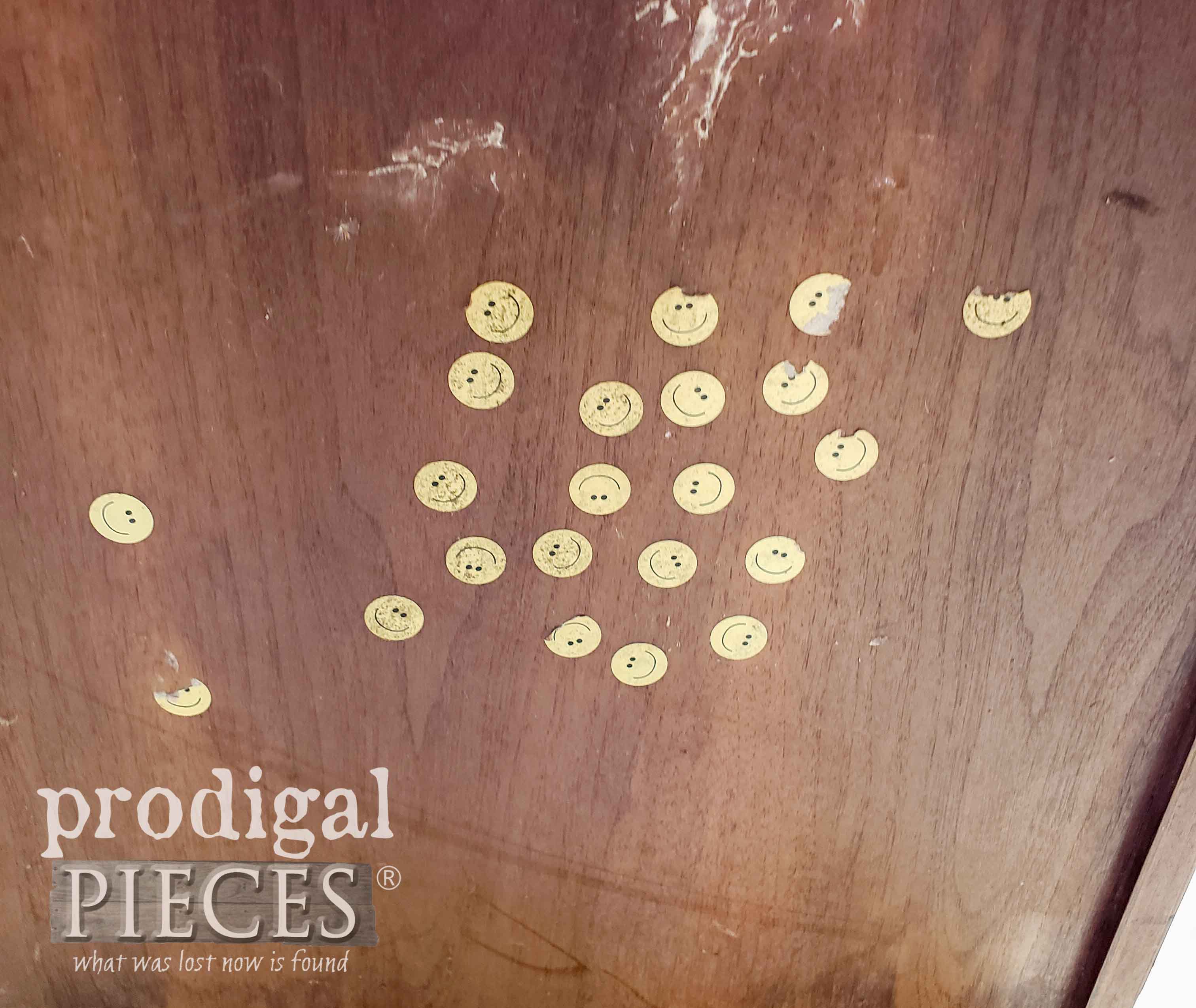 Smiley Face Stickers on Back of Sewing Desk | prodigalpieces.com