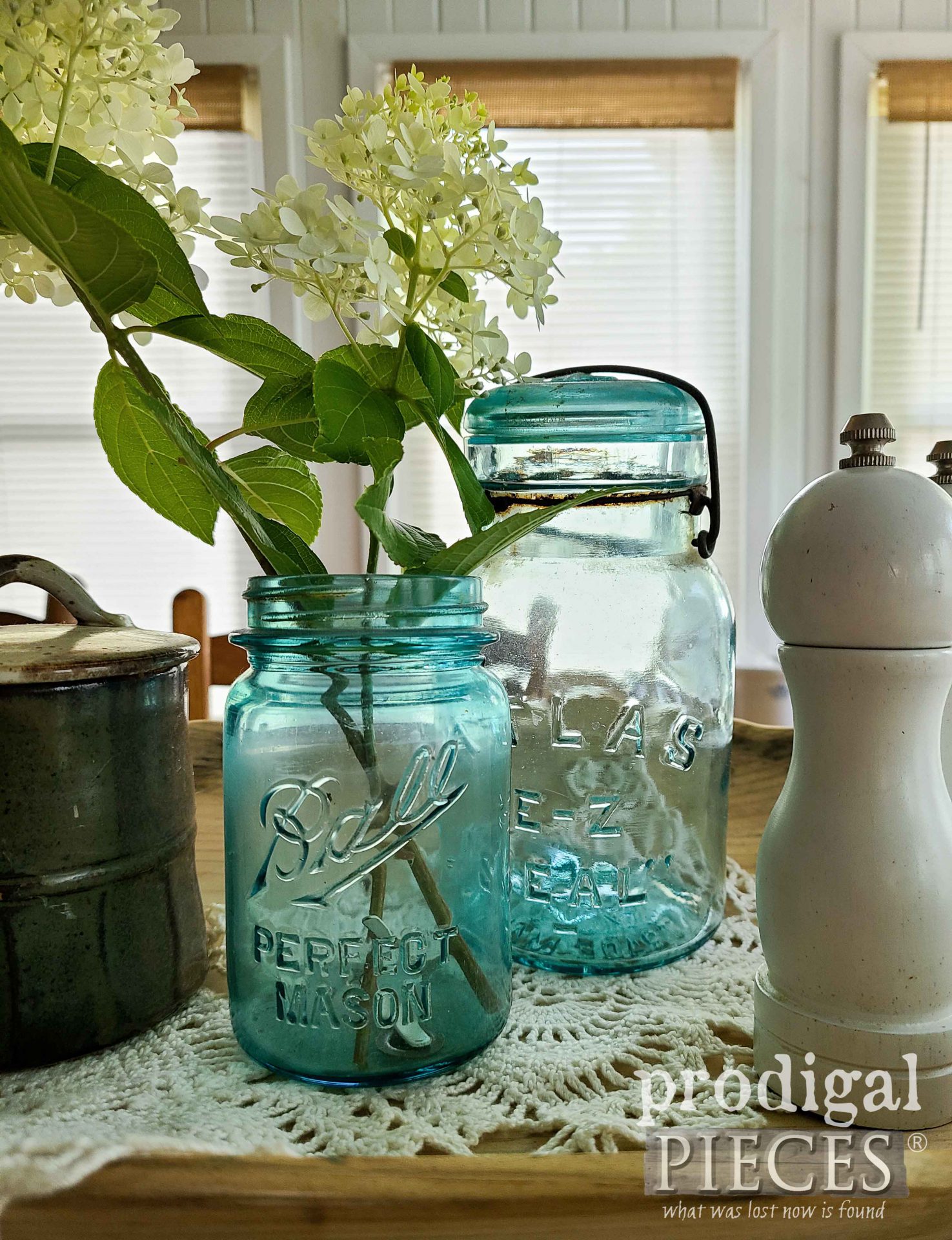 Anitque Blue Ball Jars with Limelight Hydrangeas in Farmhouse Dough Bowl by Prodigal Pieces | prodigalpieces.com #prodigalpieces #farmhouse #balljar #home