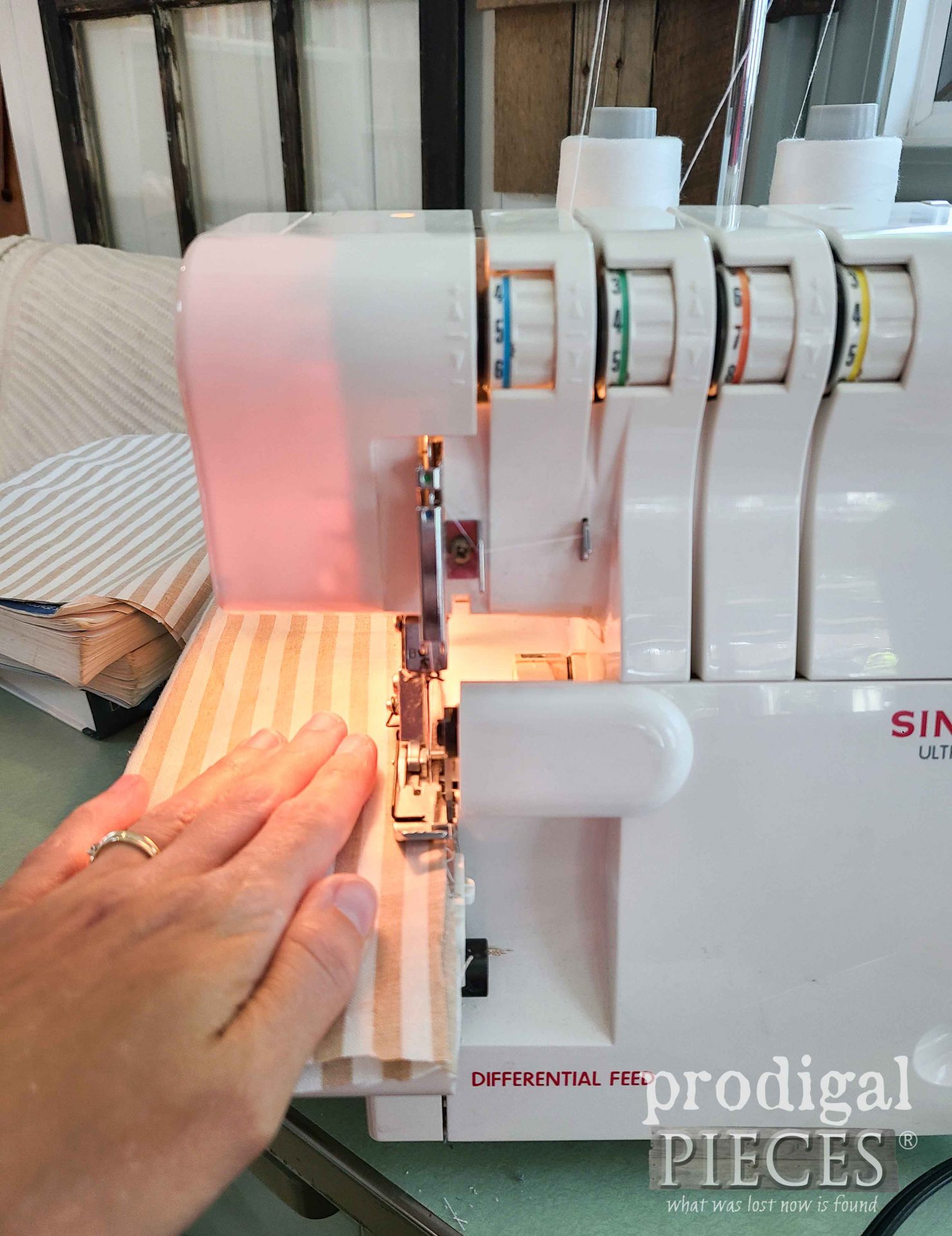 Serging Refashioned Pants into ladies' smocked blouse| prodigalpieces.com