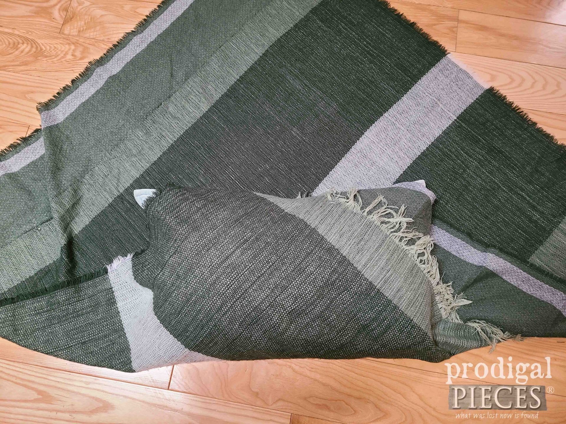 Folding Thrifted Scarf Around Pillow | prodigalpieces.com
