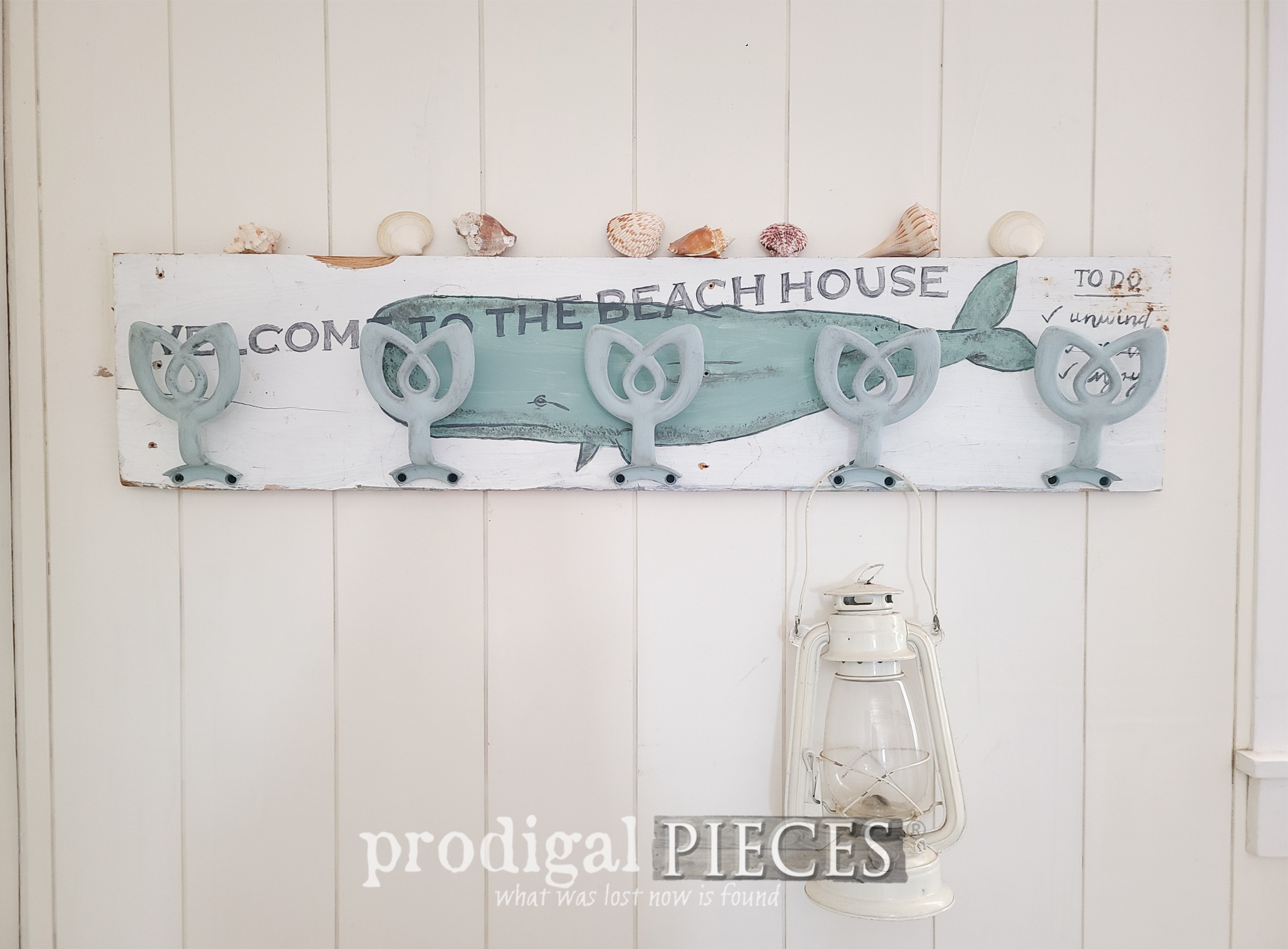 Take those broken parts and make an upcycled ceiling fan hardware coat rack | Tutorial by Larissa of Prodigal Pieces | prodigalpieces.com #prodigalpieces #diy #upcycled #homedecor #coastal #beach