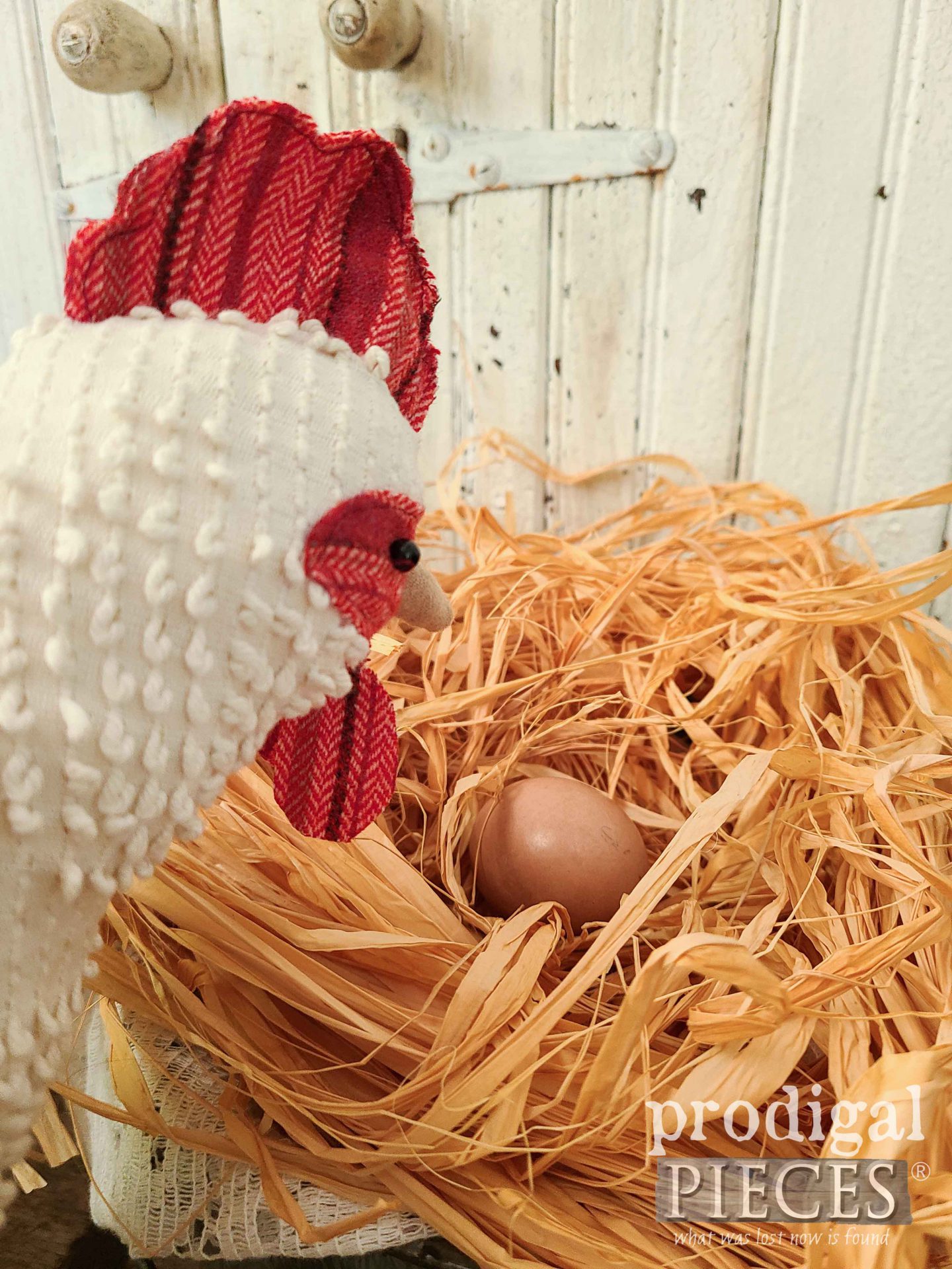 Hen Looking at Egg in Nest by Larissa of Prodigal Pieces | prodigalpieces.com #prodigalpieces #hen #farmhouse