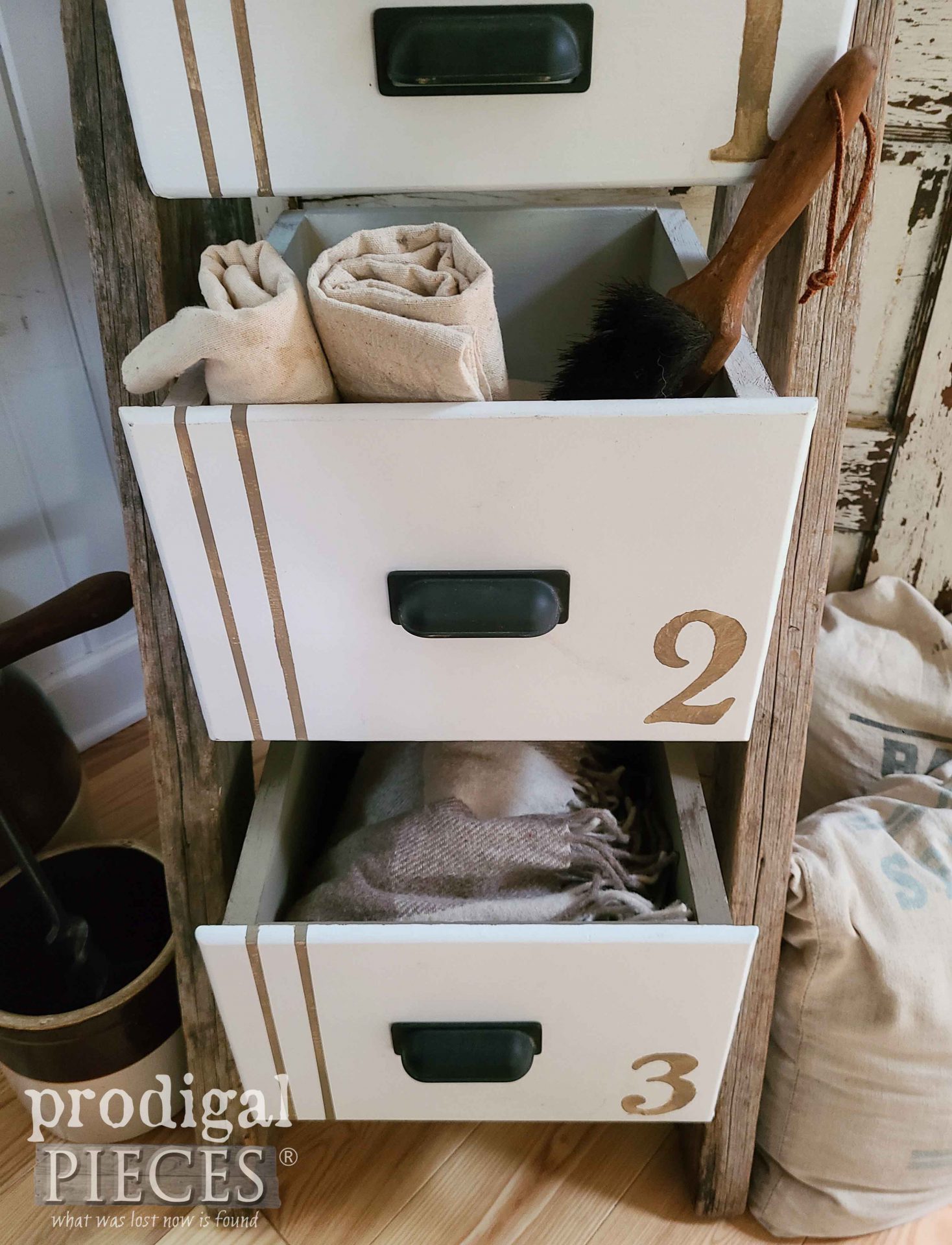 Numbered Tiered Drawer Stand Made from Reclaimed Ladder by Larissa of Prodigal Pieces | prodigalpieces.com #prodigalpieces #handmade #reclaimed #diy