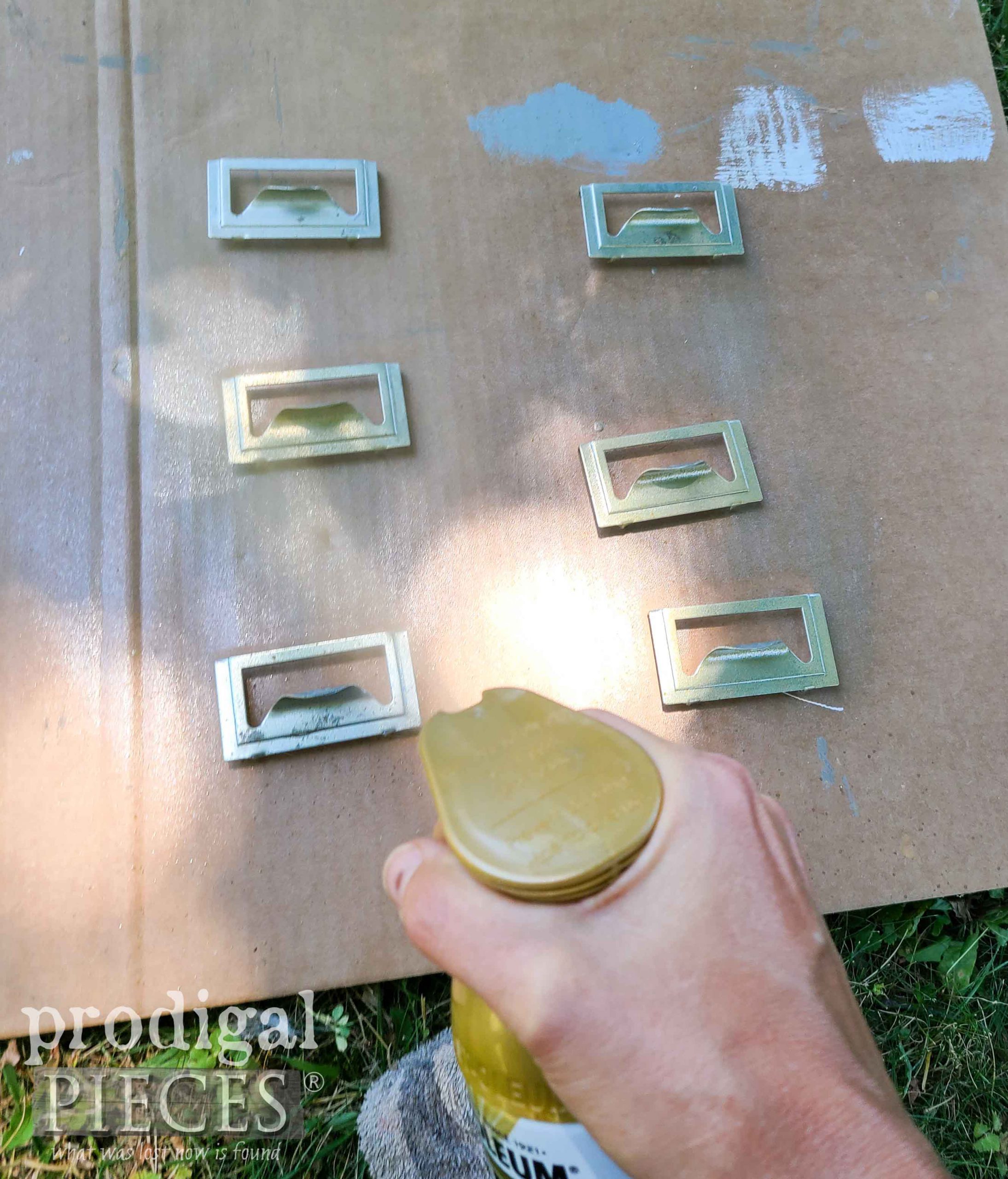 Spray Painting Filing Cabinet Pulls | prodigalpieces.com #prodigalpieces