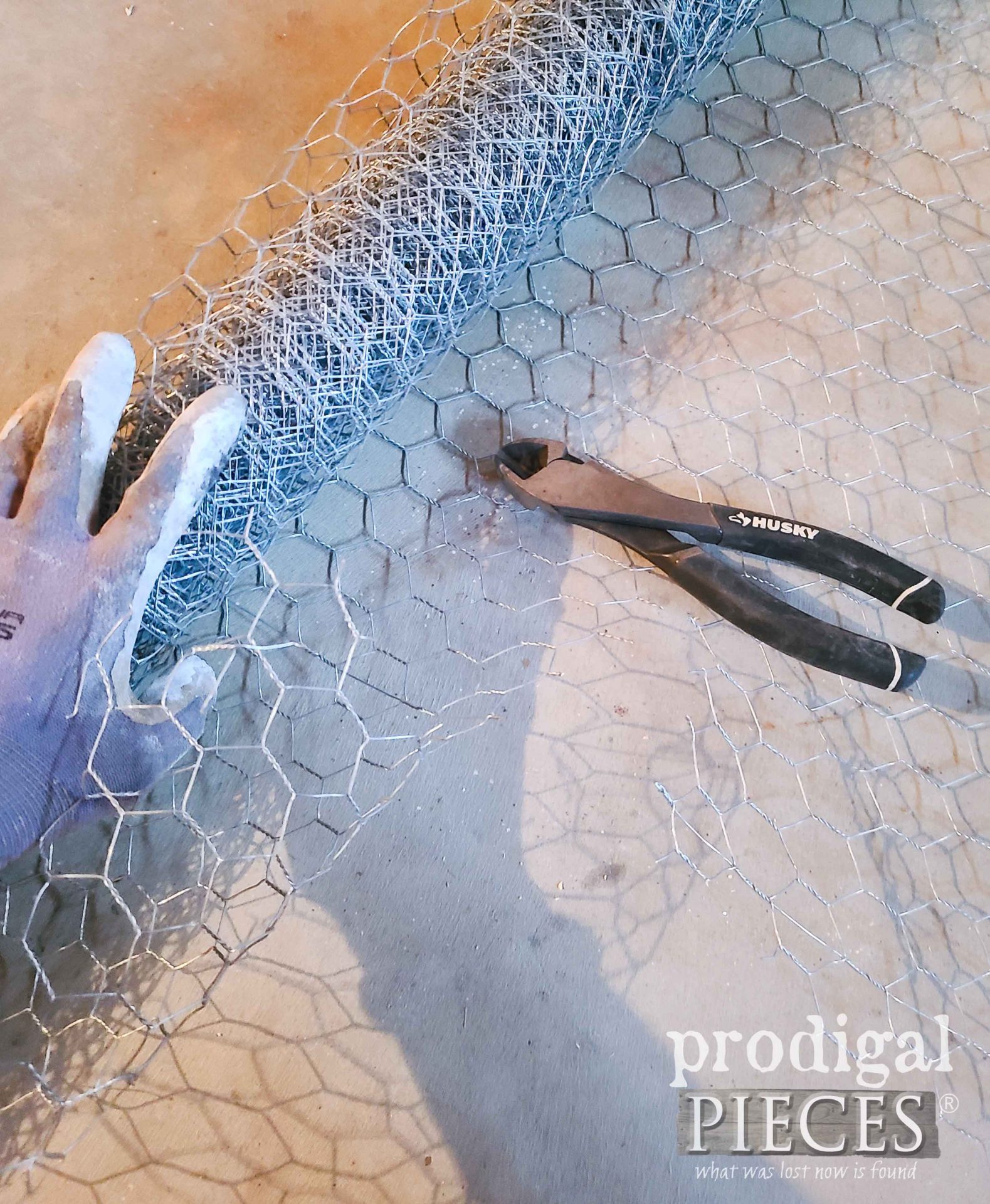 Cutting Chicken Wire for Pie Safe | prodigalpieces.com #prodigalpieces