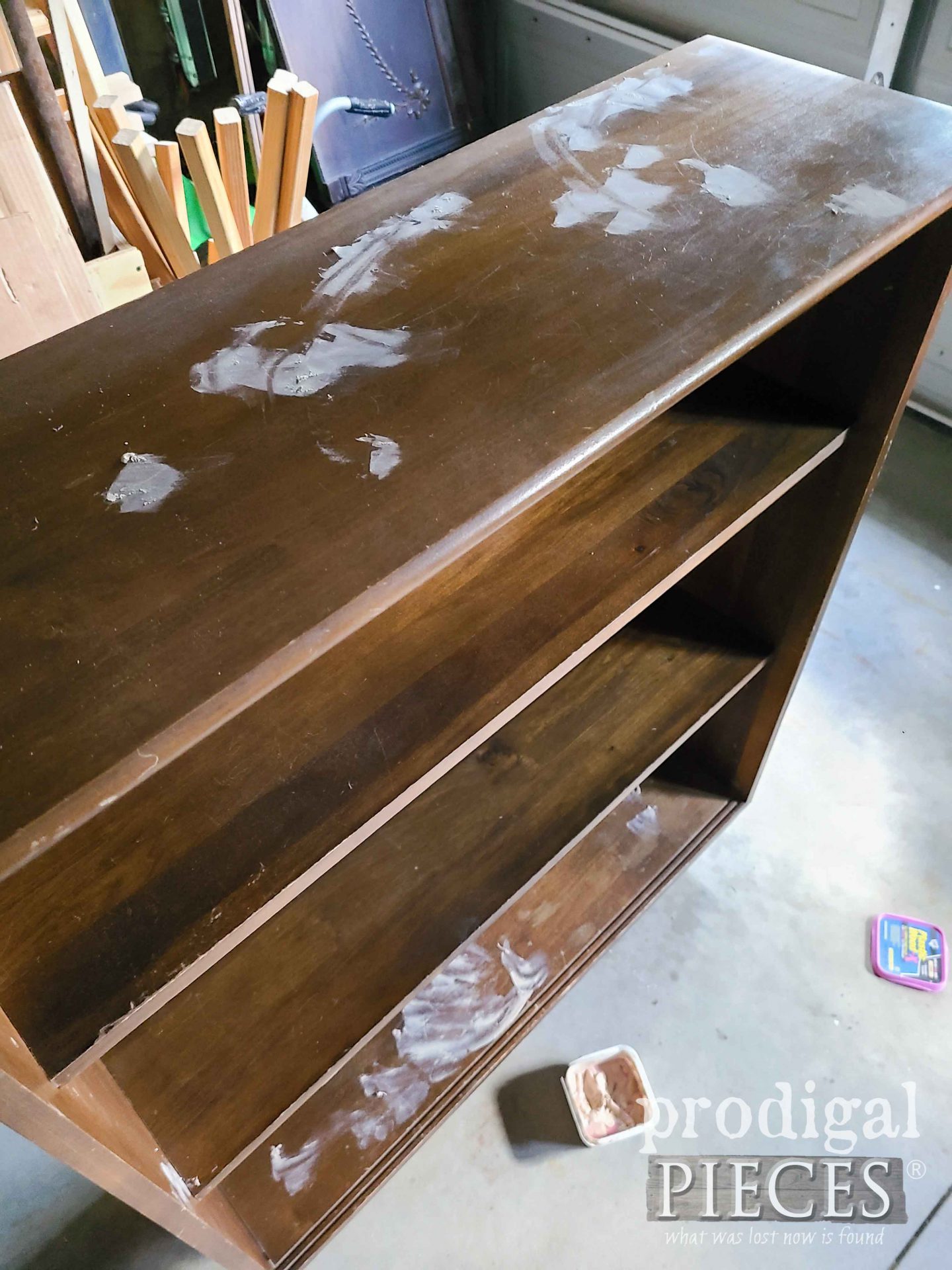 Using Wood Filler to Repair Mid Century Modern Bookcase | prodigalpieces.com #prodigalpieces