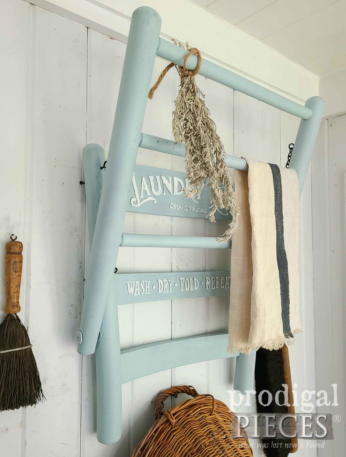 DIY Folding Drying Rack Upcycled from a Vintage Caned Chair by Larissa of Prodigal Pieces | prodigalpieces.com #prodigalpieces #vintage #upcycled #diy