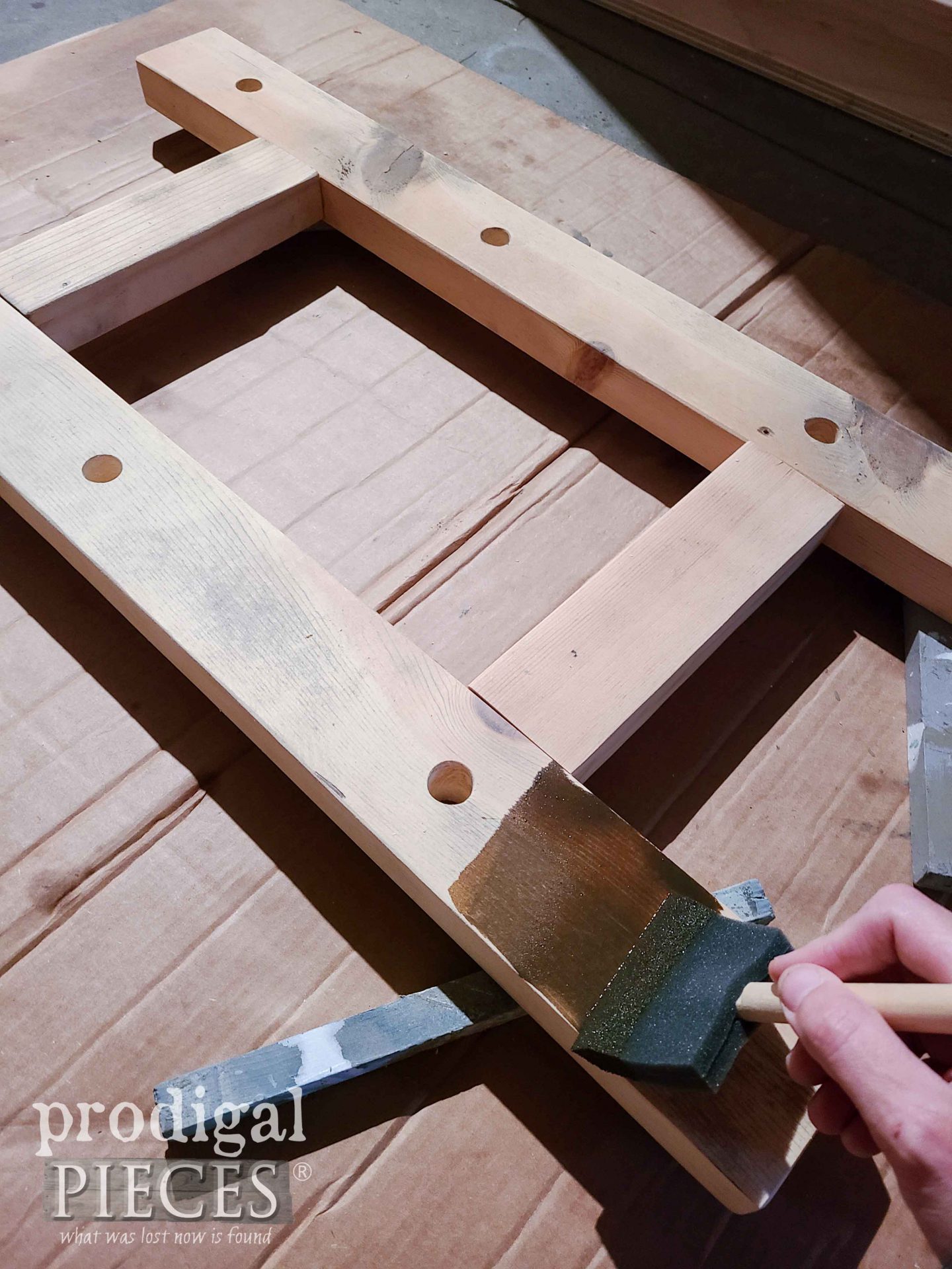 Staining DIY Storage Rack from Upcycled Spindles | prodigalpieces.com #prodigalpieces