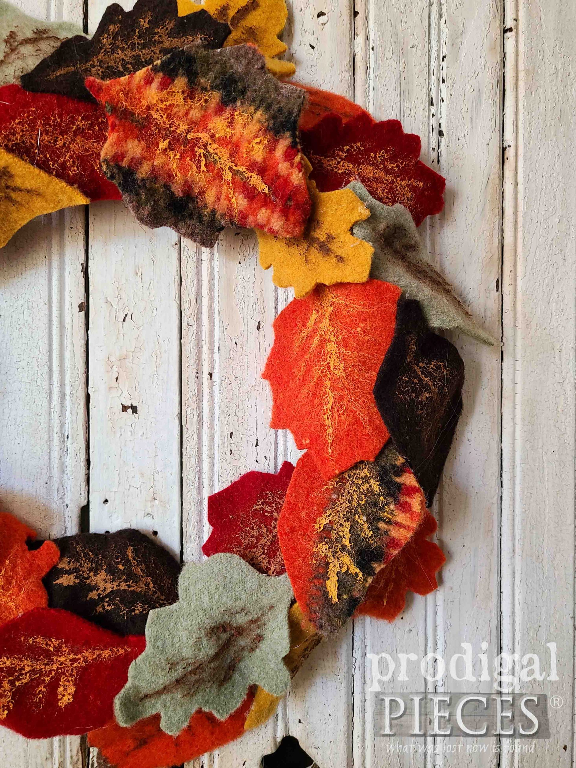 Close-up of Felted Sweater Fall Wreath with Wool Leaf Tutorial by Larissa of Prodigal Pieces | prodigalpieces.com #prodigalpieces #fall #autumn #diy #handmade