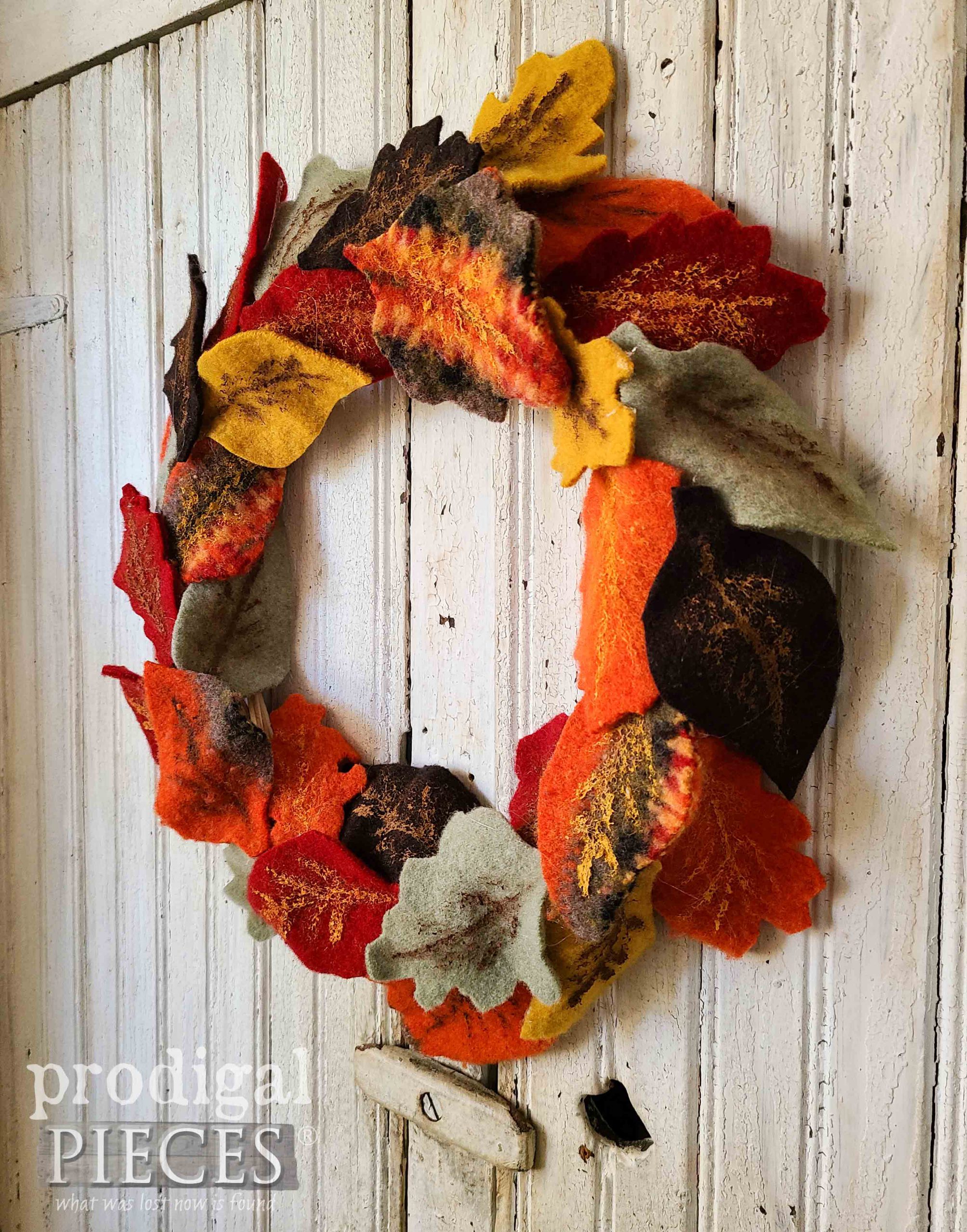 Side View of Felted Sweater Fall Wreath with Leaves by Larissa of Prodigal Pieces | prodigalpieces.com #prodigalpieces #farmhouse #fall #crafts #budgetdecor