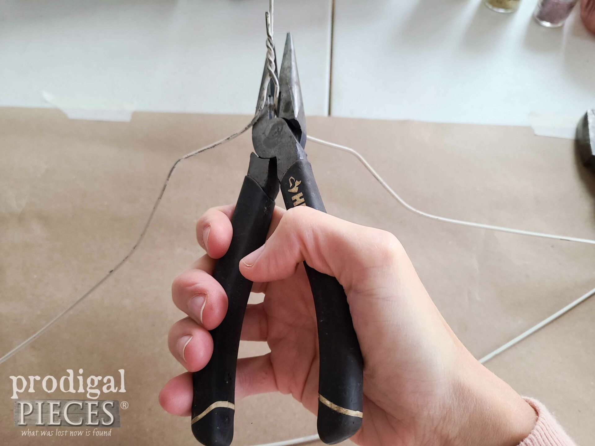 Clipping Wire Hanger for Repurposed Christmas Ornaments | prodigalpieces.com #prodigalpieces