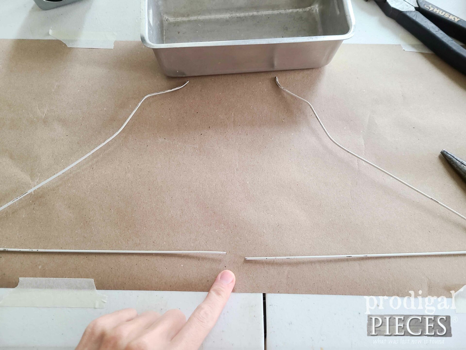 Cutting Wire Hanger for Upcycled Bread Pan Sleigh | prodigalpieces.com #prodigalpieces