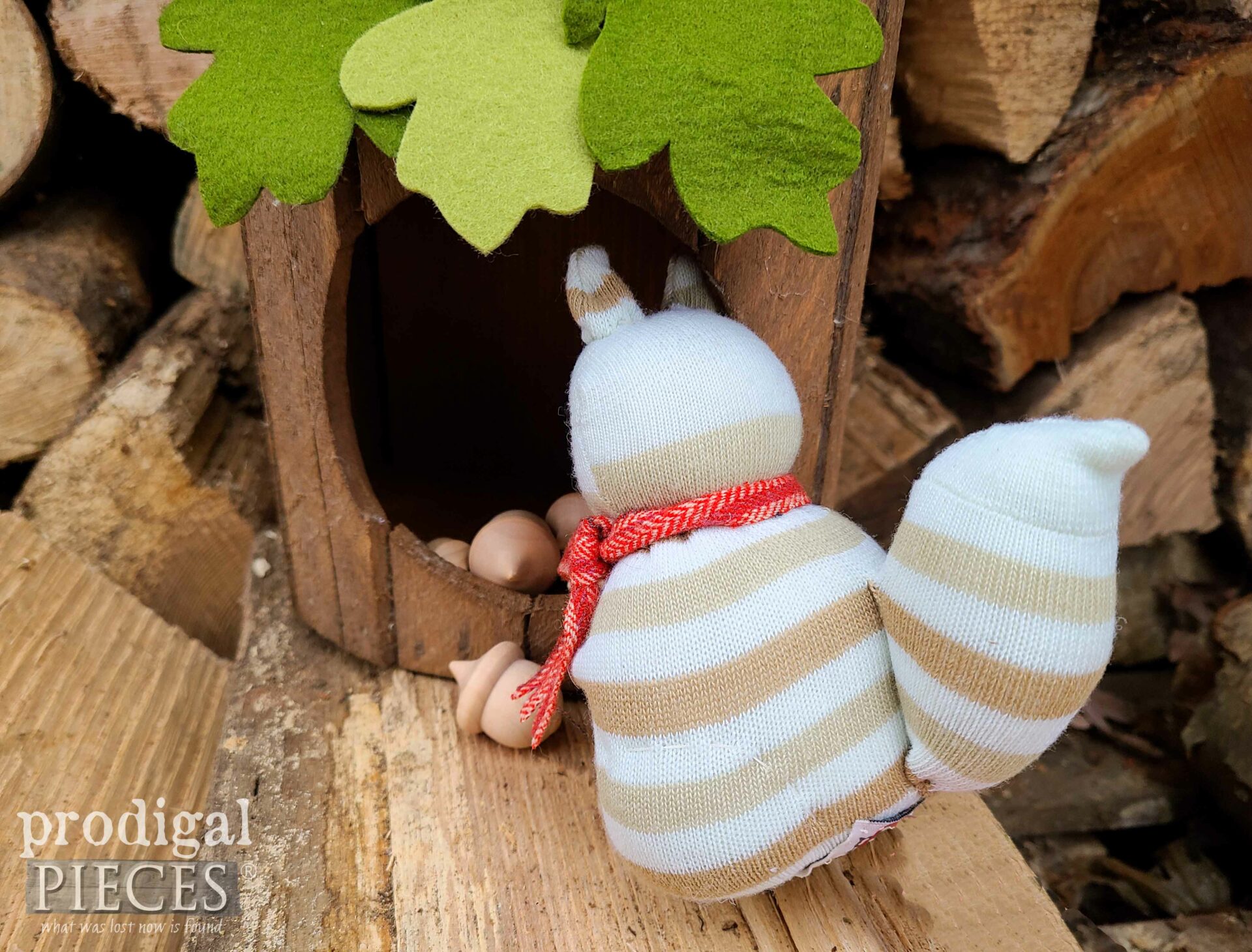 Super Cute Sock Squirrel Tucking Away Wooden Acorns in Playset by Larissa of Prodigal Pieces | prodigalpieces.com #prodigalpieces #repurposed #toys #playset #handmade