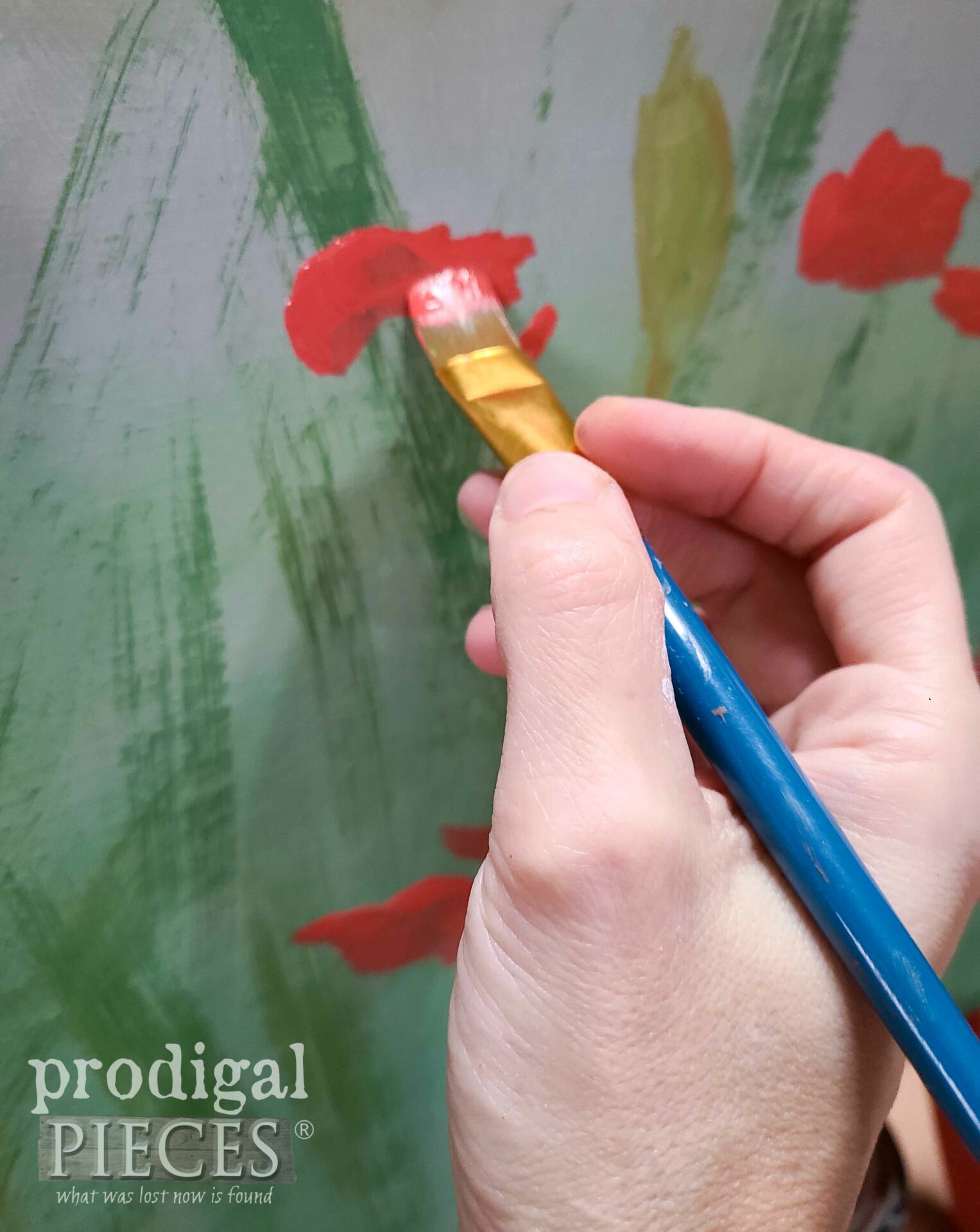 Hand-painting poppy flowers for tilt top table by Larissa of Prodigal Pieces | prodigalpieces.com #prodigalpieces