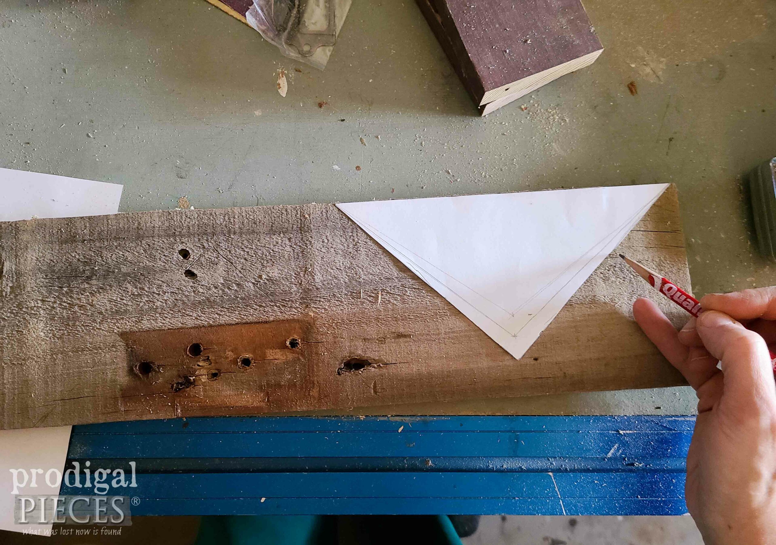 Tracing Reclaimed Wall Pocket Sides onto Fence Board | prodigalpieces.com #prodigalpieces