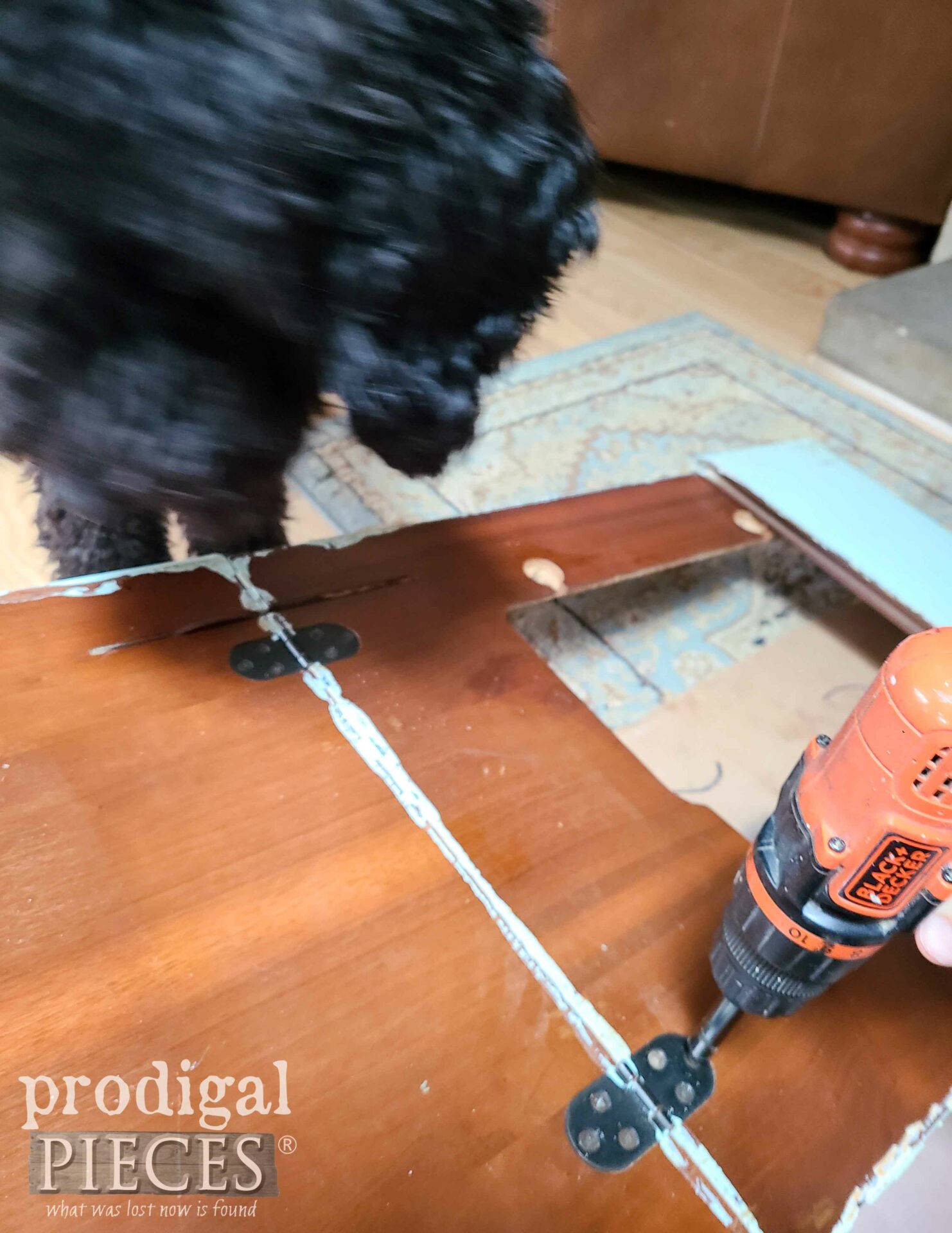 Removing Hinges from Repurposed Sewing Machine Table Top | prodigalpieces.com #prodigalpieces