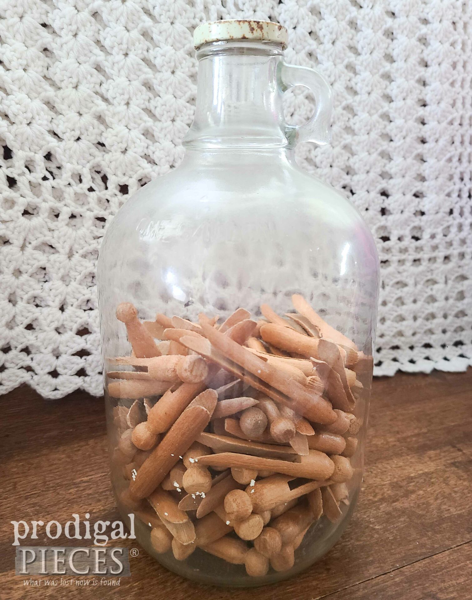 Whiskey Jug of Antique Clothespins for Refashioning | prodigalpieces.com #prodigalpieces