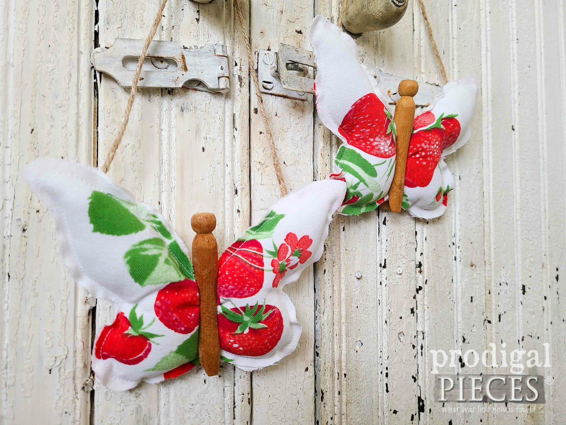 Closeup of Strawberry Butterflies made from Refashioned Tablecloth by Larissa of Prodigal Pieces | prodigalpieces.com #prodigalpieces #refashion #diy #upcycled
