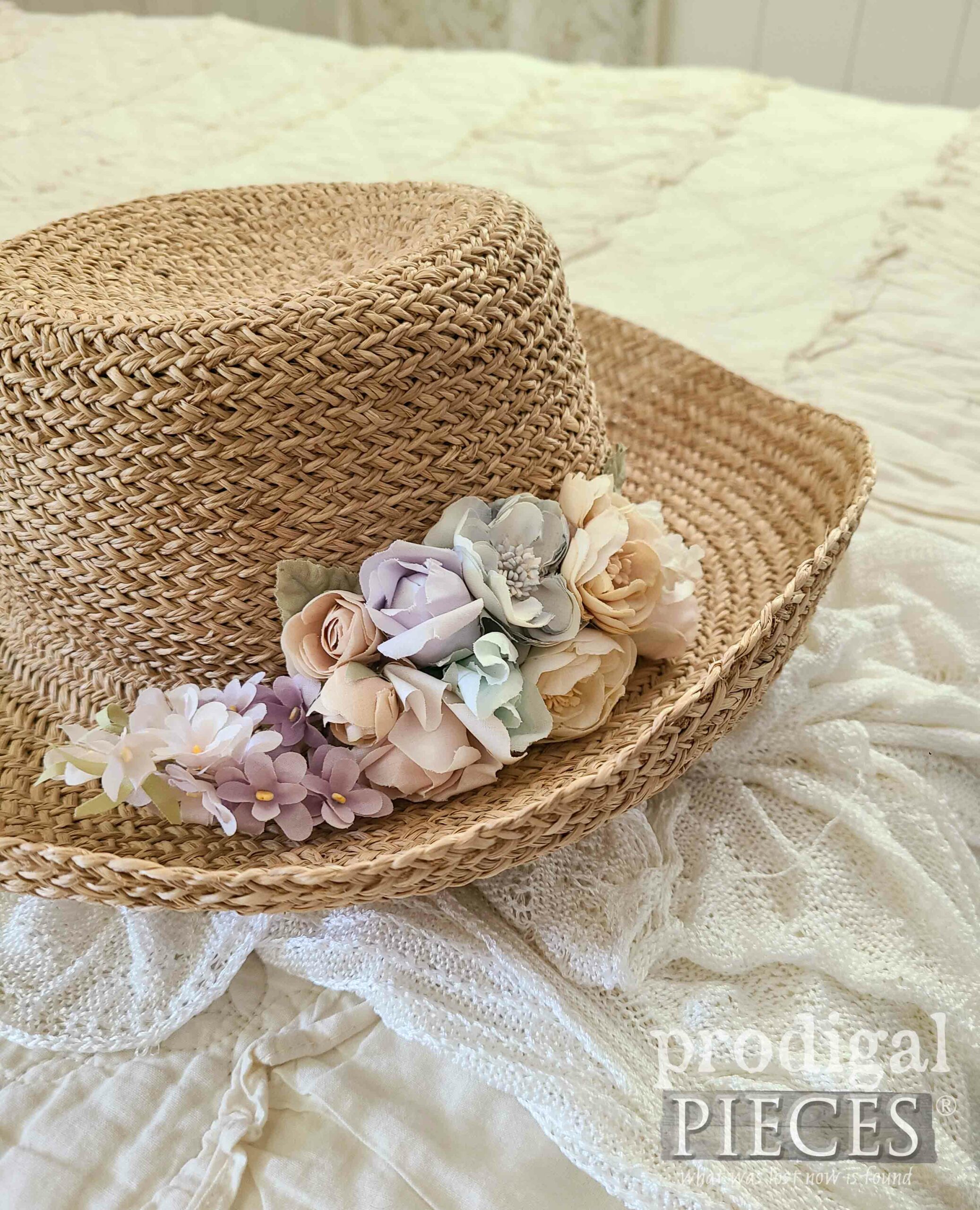 Floral Straw Hat on Bed by Prodigal Pieces | prodigalpieces.com #prodigalpieces #hat #fashion