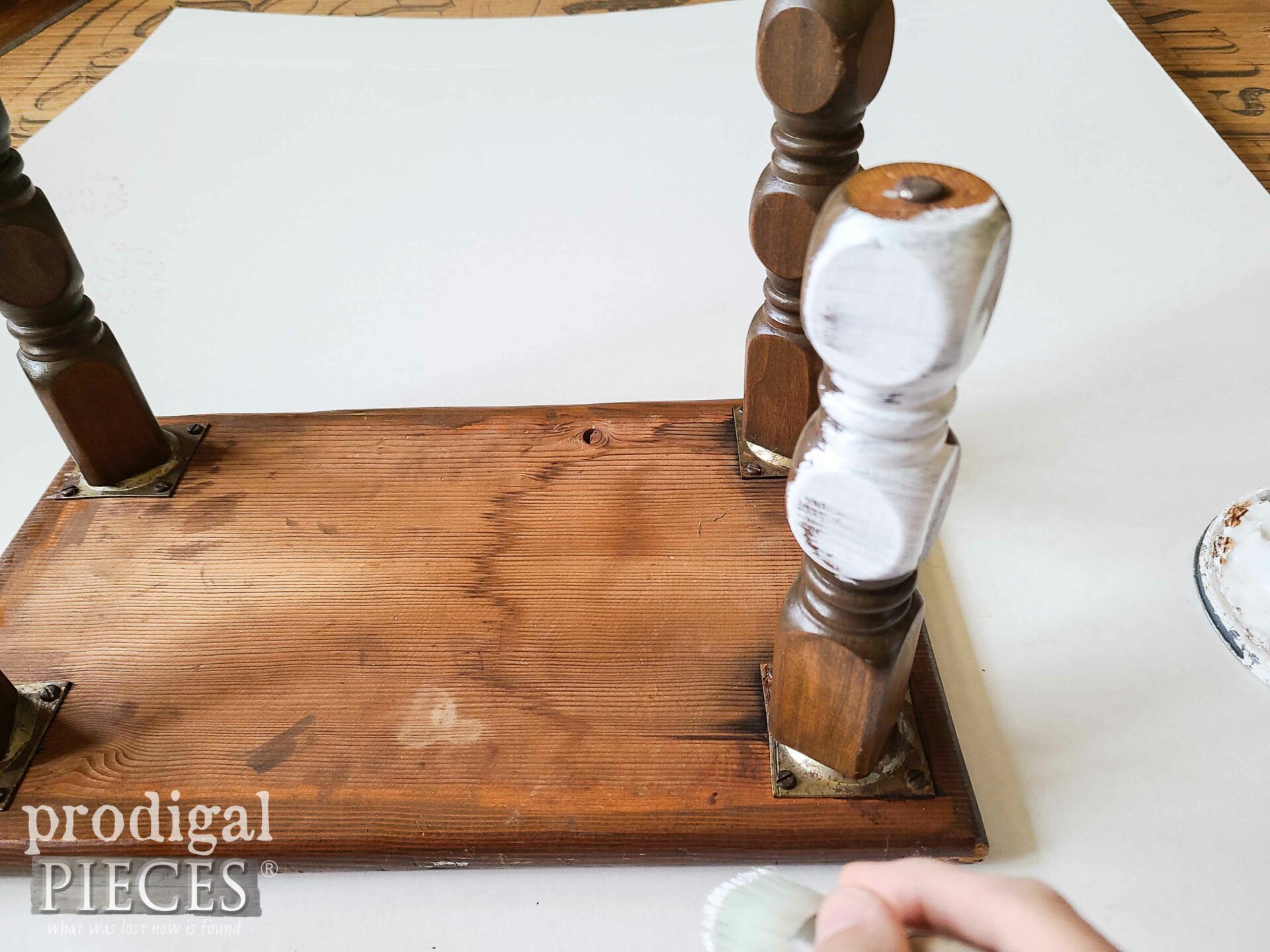 Painting Wooden Footstool Legs with White Paint | prodigalpieces.com #prodigalpieces