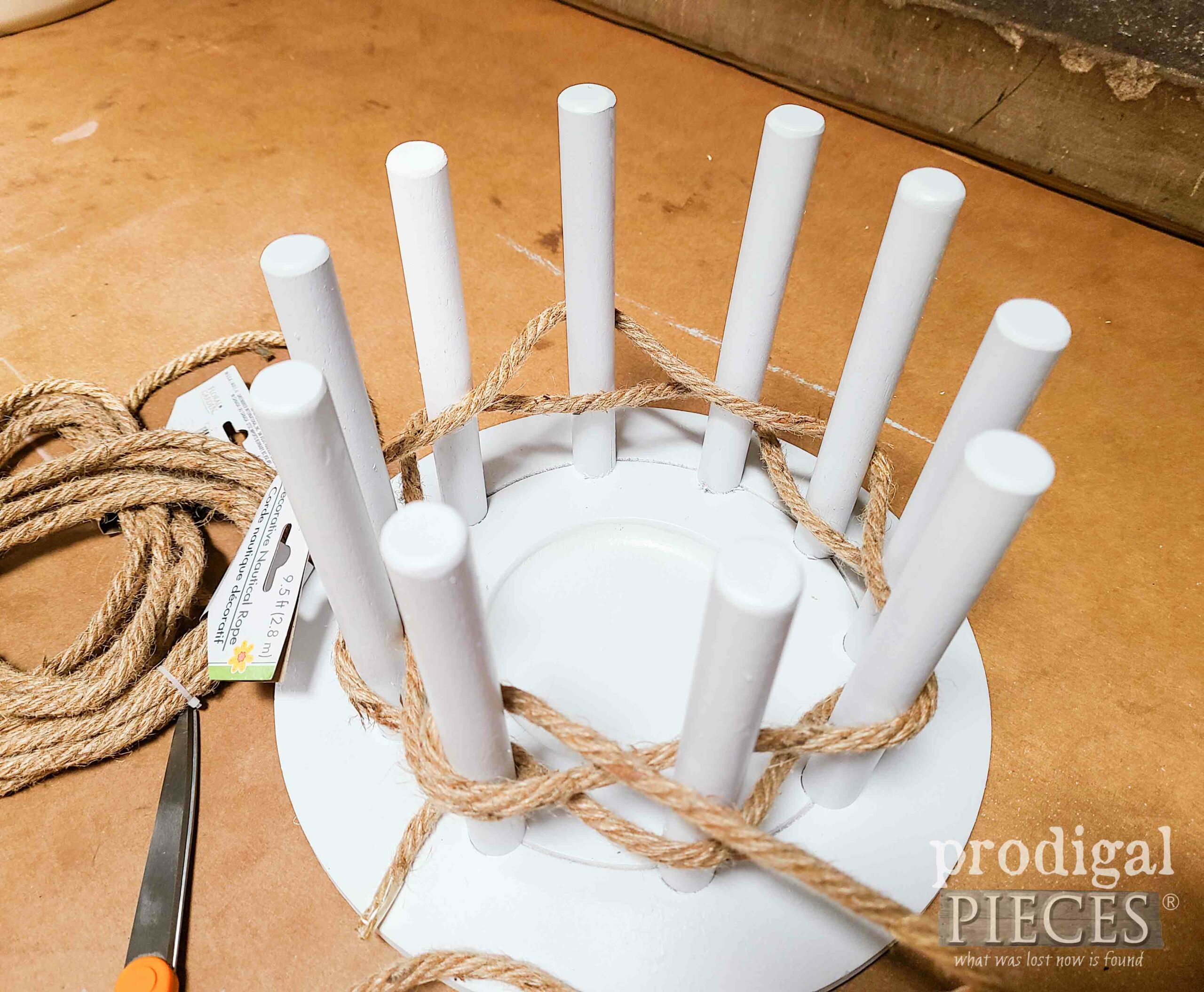Weaving Rope around DIY Rope Vase Centerpiece Base | prodigalpieces.com #prodigalpieces
