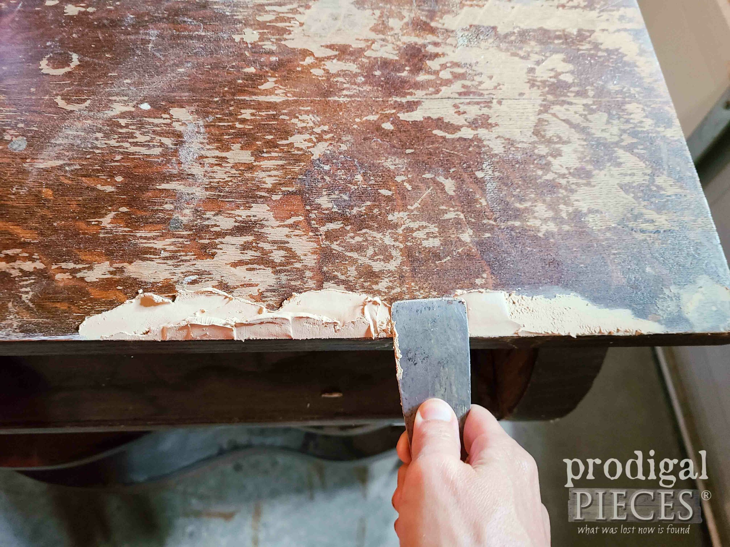 Applying Wood Filler to Damaged Dresser Top | prodigalpieces.com #prodigalpieces