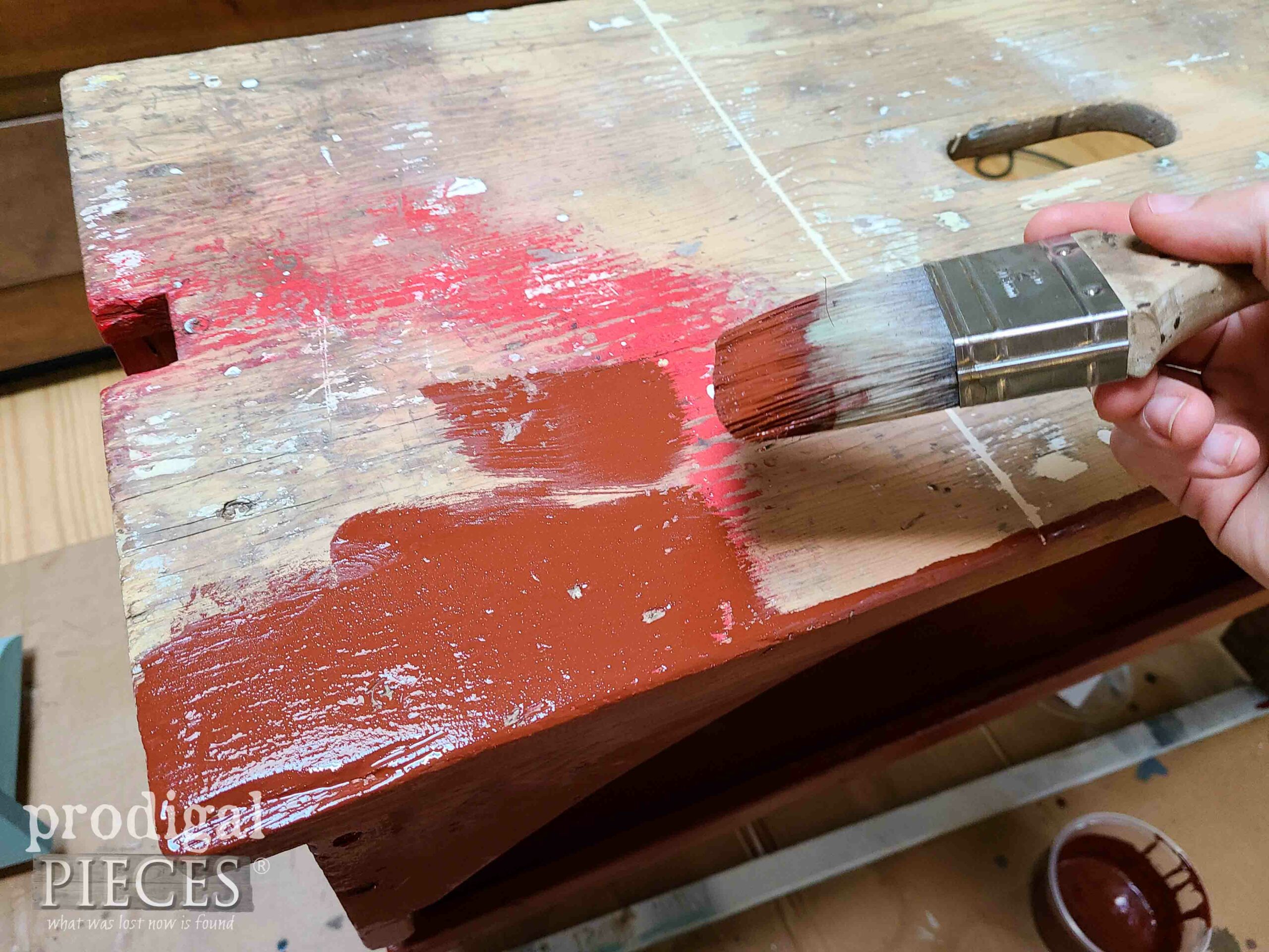 Painting Red Milk Paint on Bench | prodigalpieces.com #prodigalpieces
