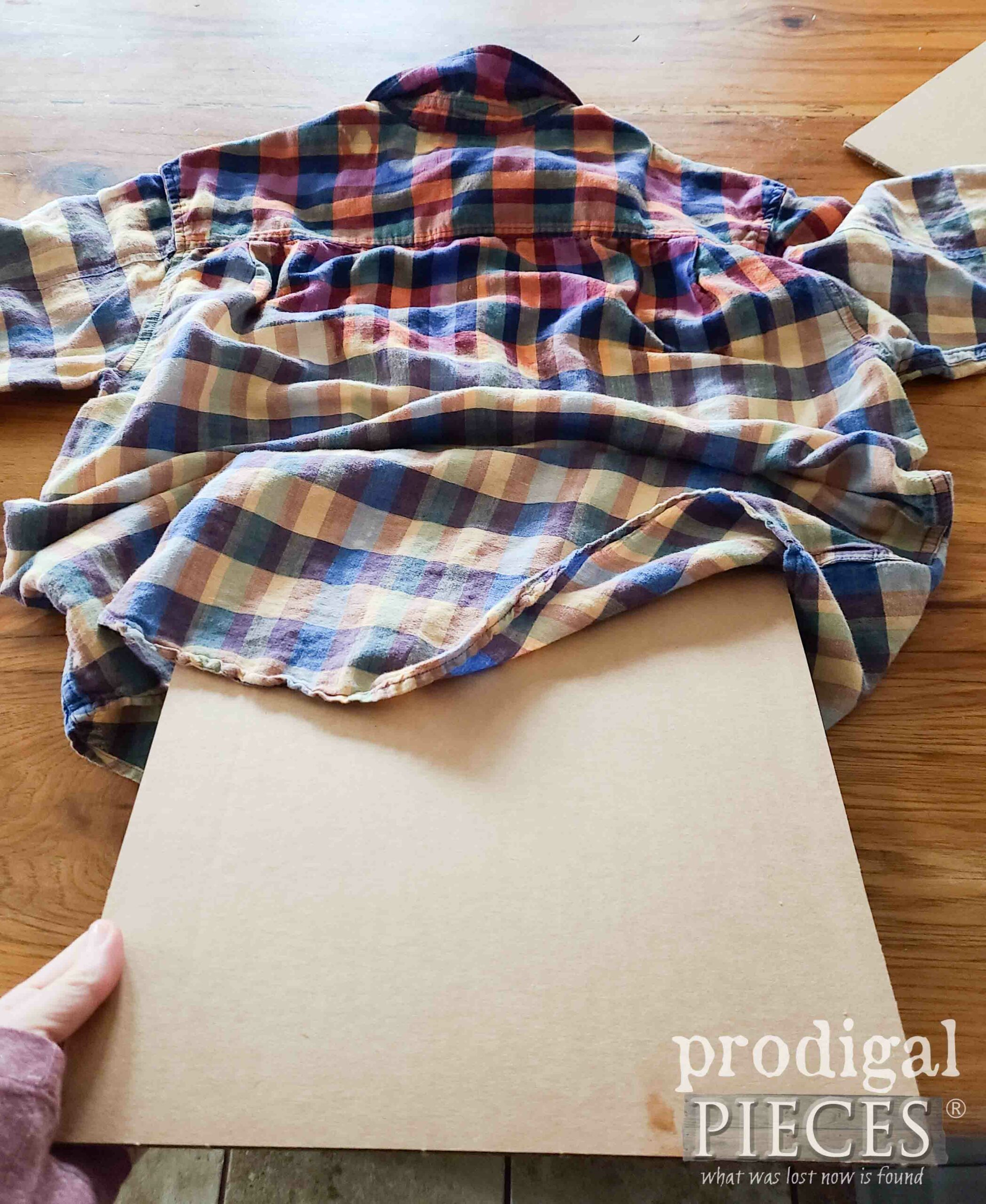 Placing Cardboard inside for Bleached Shirt Tutorial | prodigalpieces.com #prodigalpieces