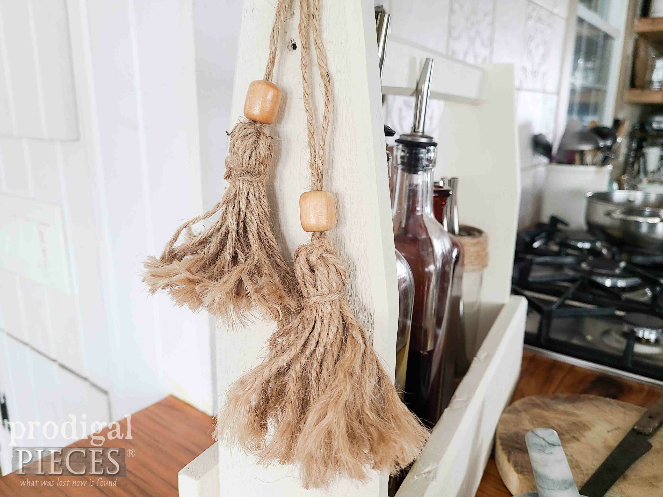 Closeup of DIY Twine Tassels on Thrifted Prim Tote Revived by Larissa of Prodigal Pieces | prodigalpieces.com #prodigalpieces Closeup of DIY Twine Tassels on Thrifted Prim Tote Revived by Larissa of Prodigal Pieces | prodigalpieces.com #prodigalpieces