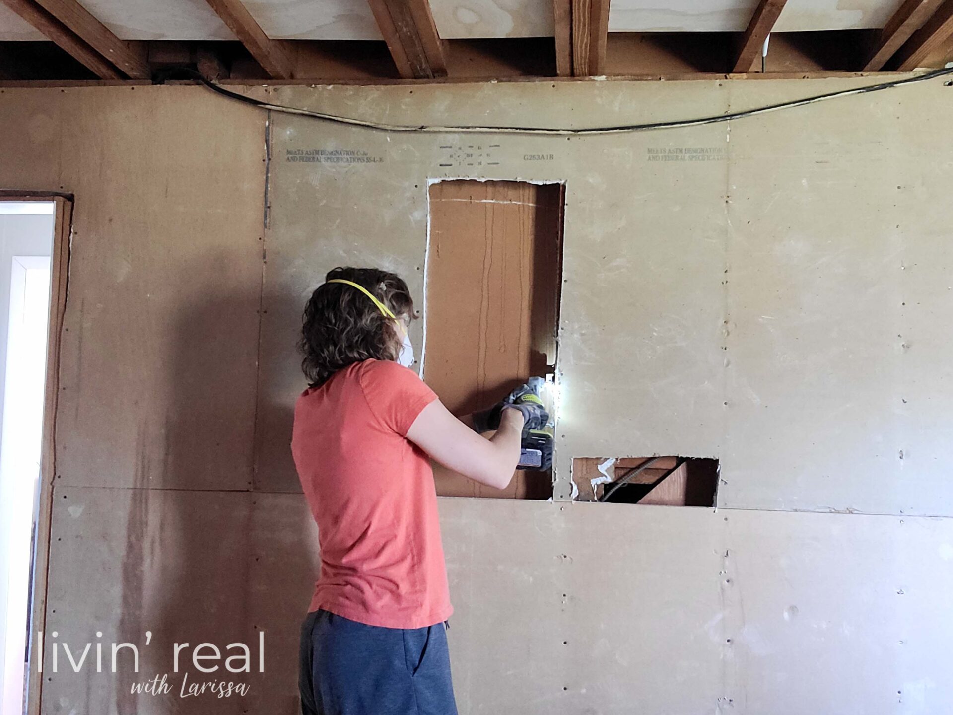 Larissa Cutting Wall for Open Staircase DIY Remodel | livinrealwithlarissa.com #livinrealwithlarissa Larissa Cutting Wall for Open Staircase DIY Remodel | livinrealwithlarissa.com #livinrealwithlarissa