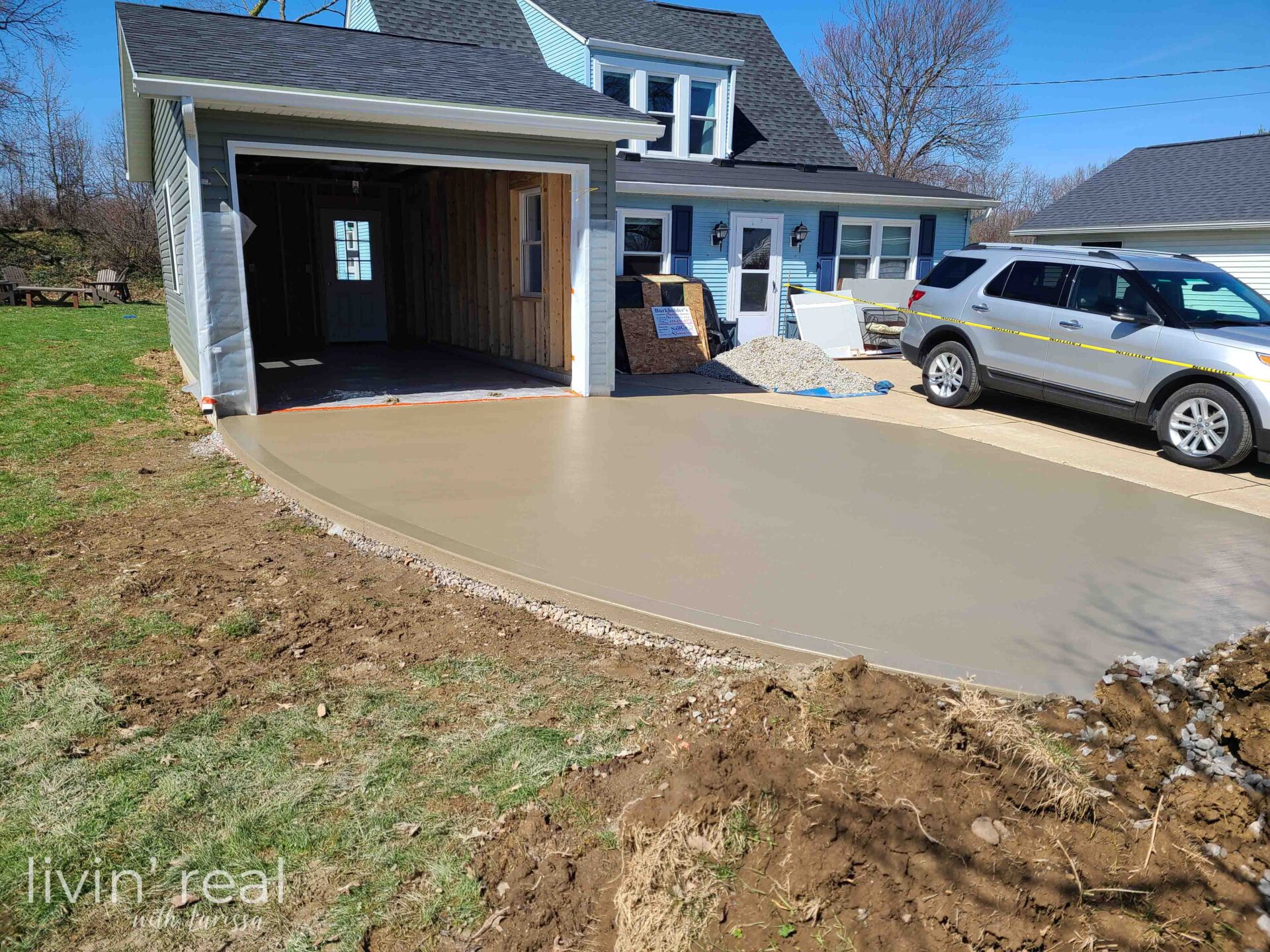 Poured Garage Concrete ready for built-in garage storage| livinrealwithlarissa.com #livinrealwithlarissa Poured Garage Concrete ready for built-in garage storage| livinrealwithlarissa.com #livinrealwithlarissa